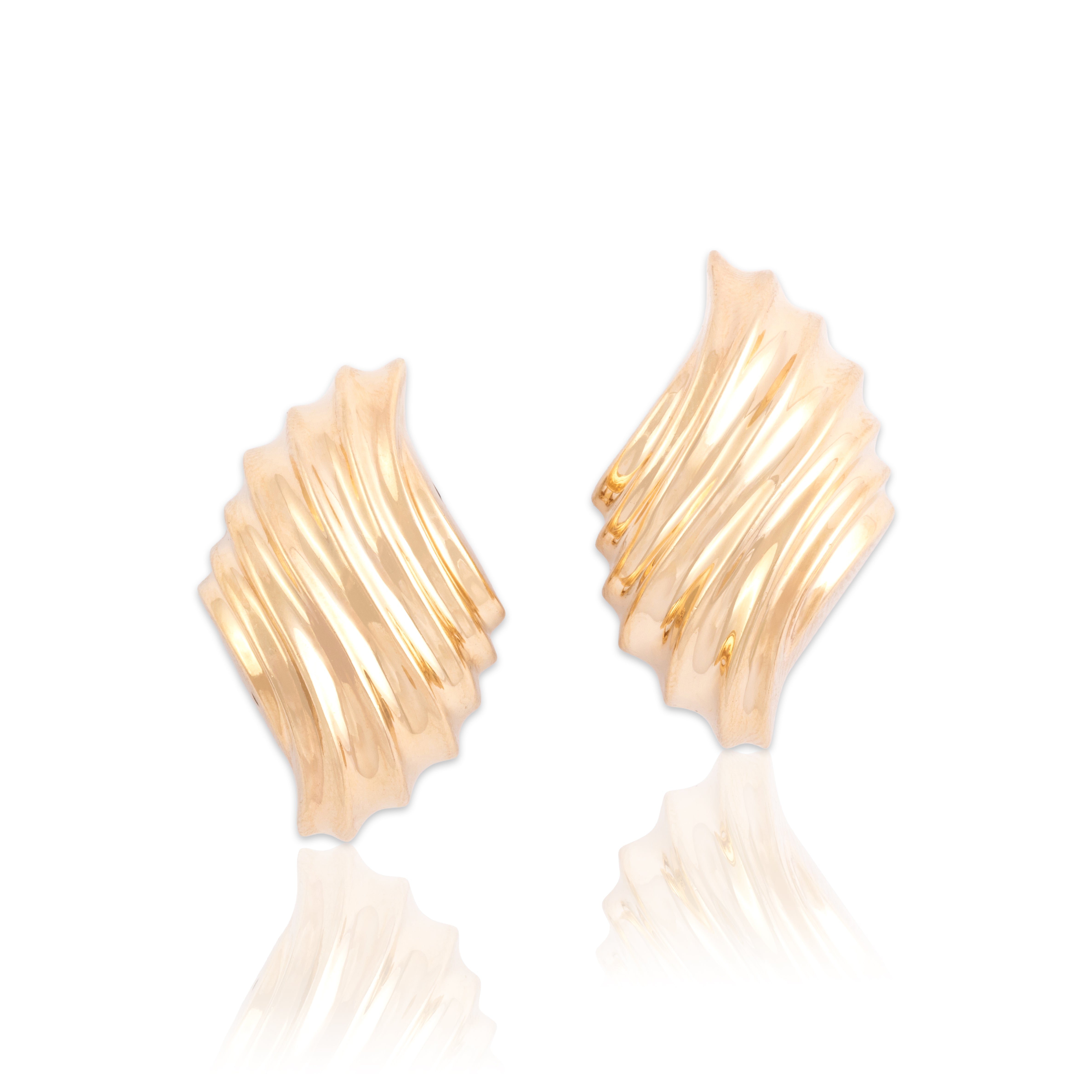 Vintage Large 14k Yellow Gold Statement Puffy Ribbed Swirl Omega-Back Earrings - Close-up view