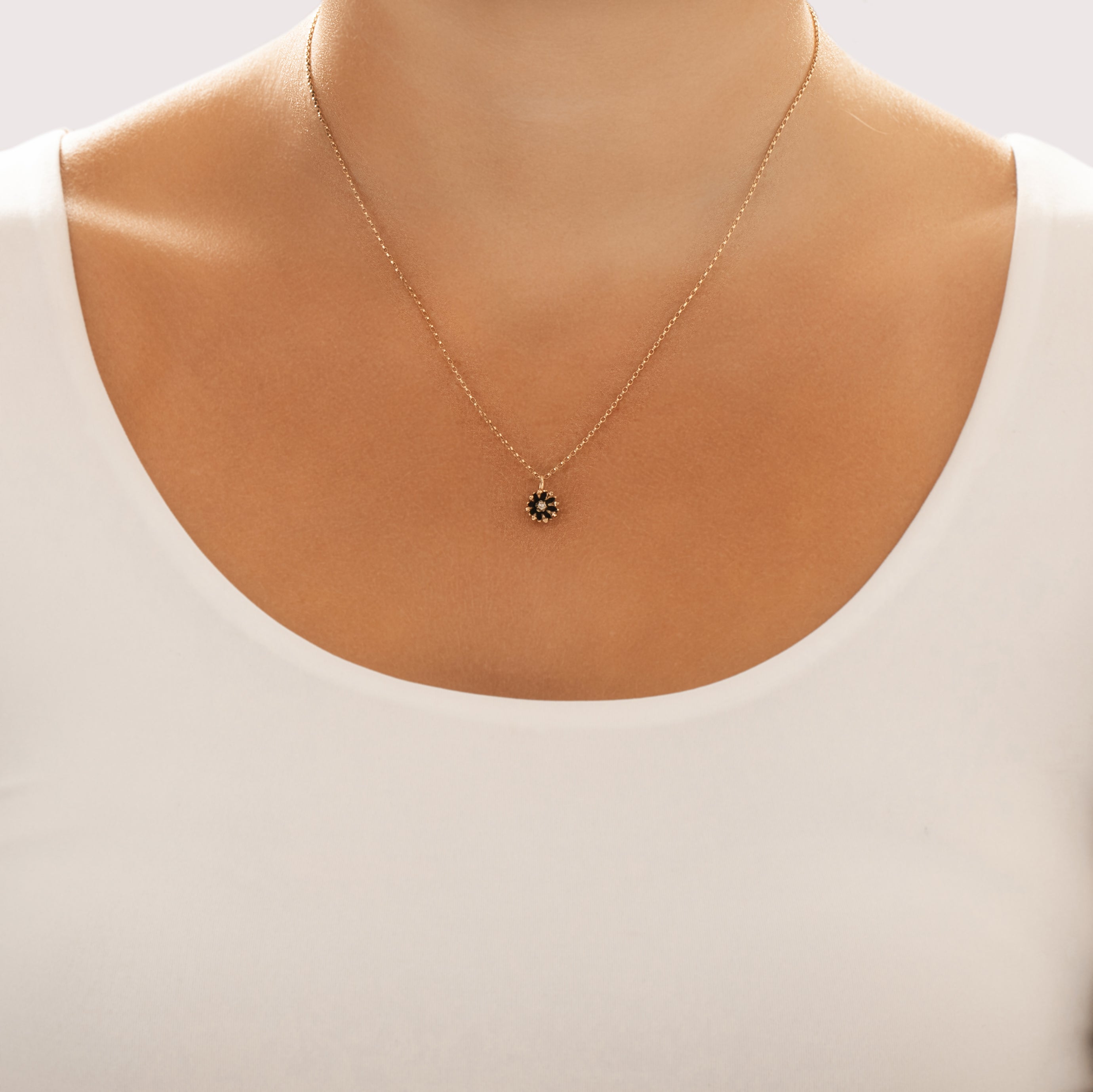 Antique Small 14k Yellow Gold Old Mine Cut Diamond Black Enamel Flower Charm / Pendant - On model view