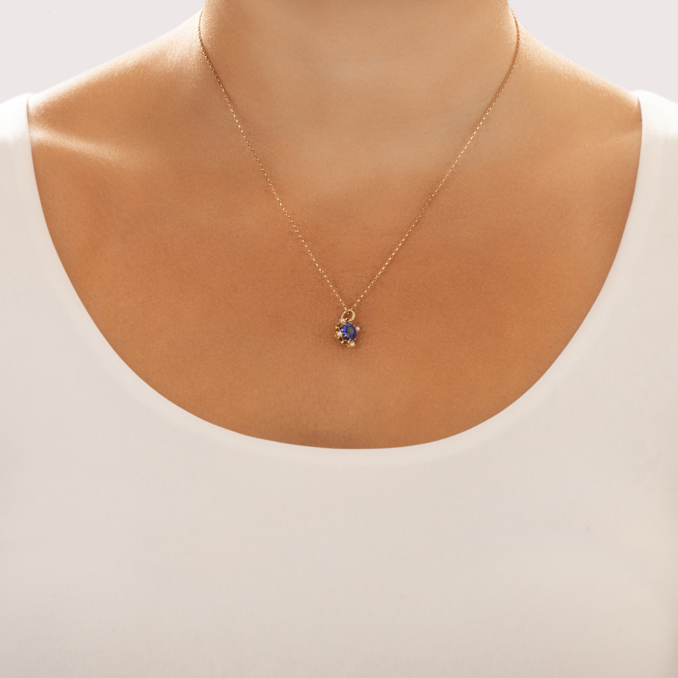 Antique 14k Yellow Gold Blue Garnet Glass Doublet Pearl Bright Quatrefoil Buttercup Pendant - On model view