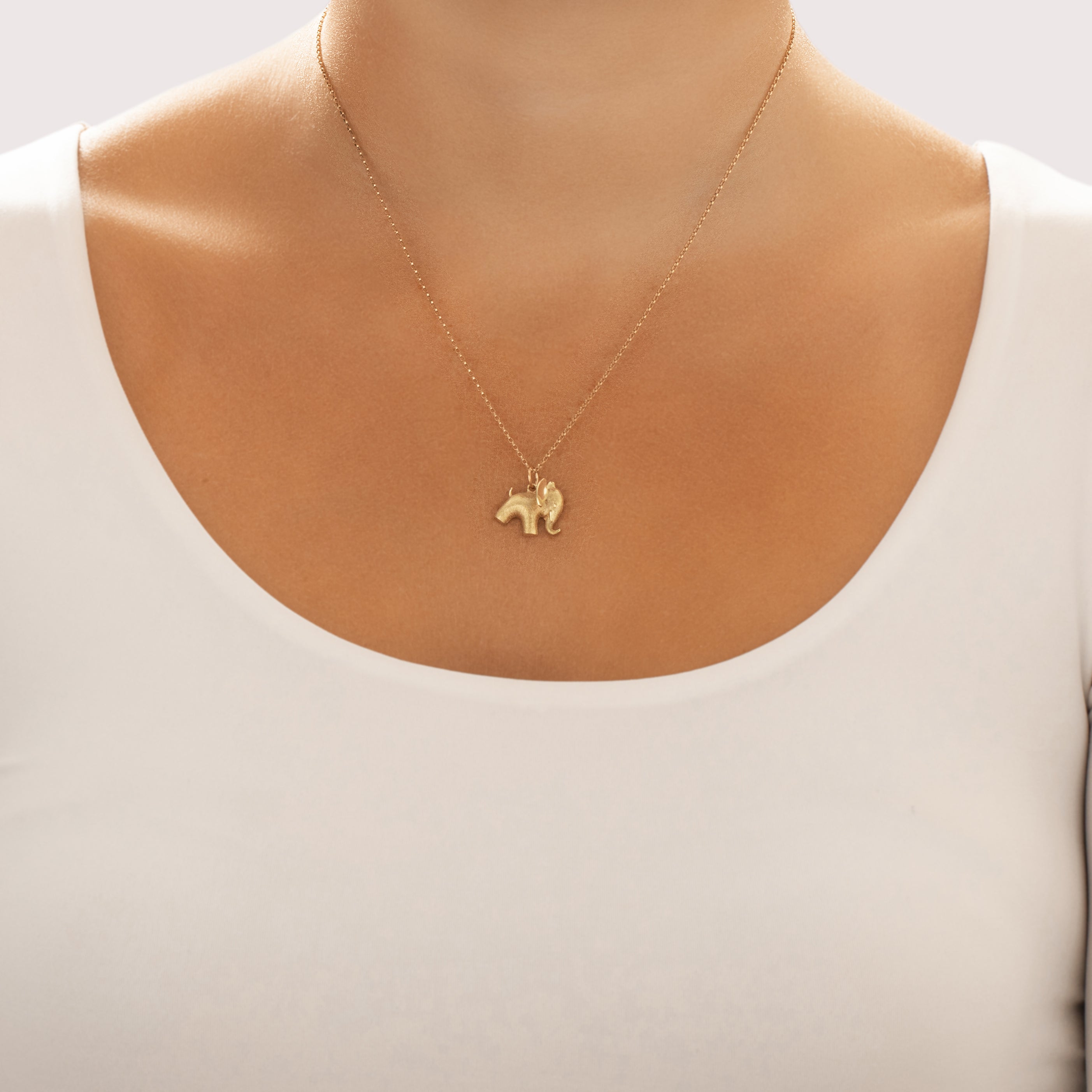 Vintage 14k Yellow Gold Adorable Brushed Puffy Elephant Charm / Pendant - On model view
