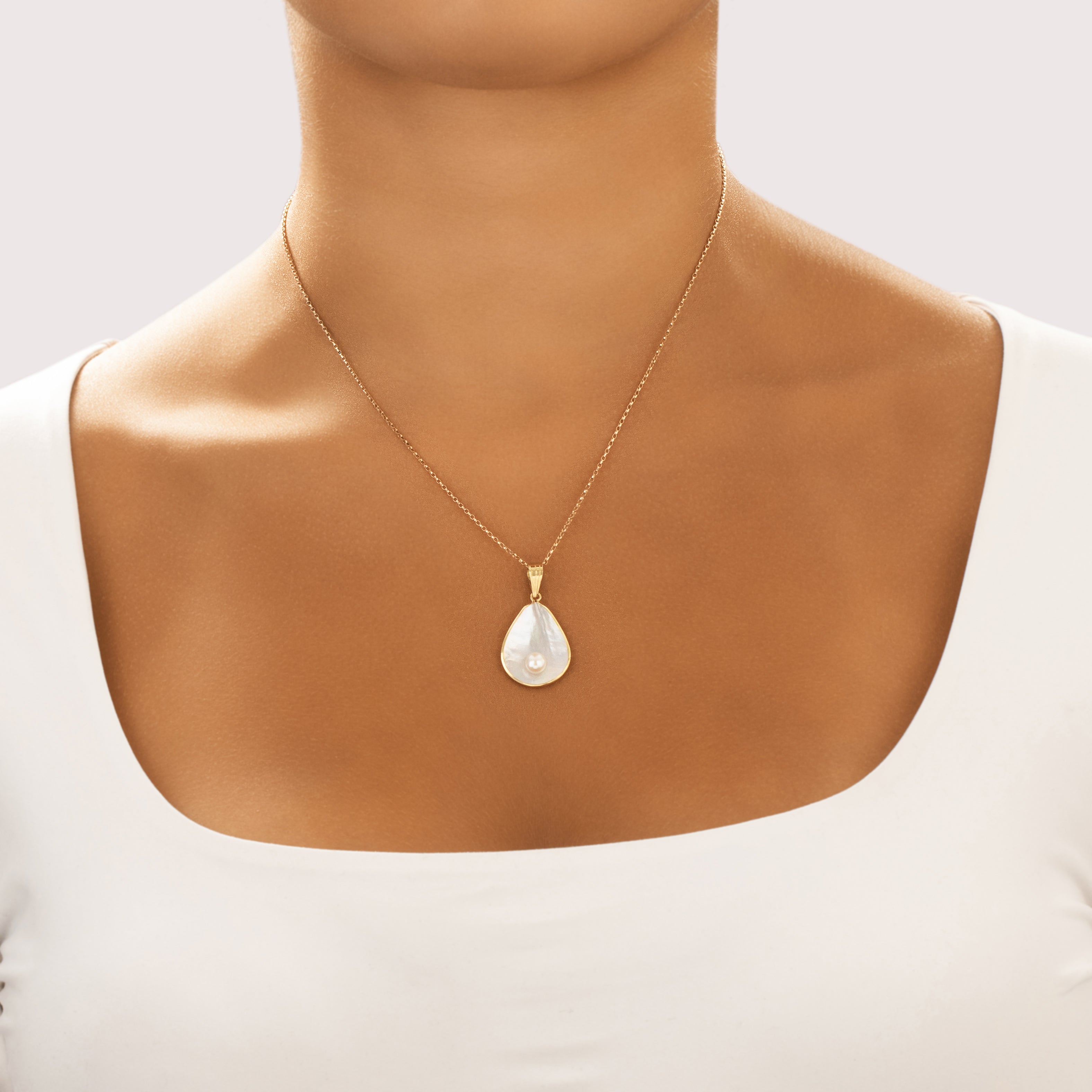 Vintage Lightweight 18k Yellow Gold Pearl Mother Of Pearl Iridescent Nautical Shell Pendant - On model view