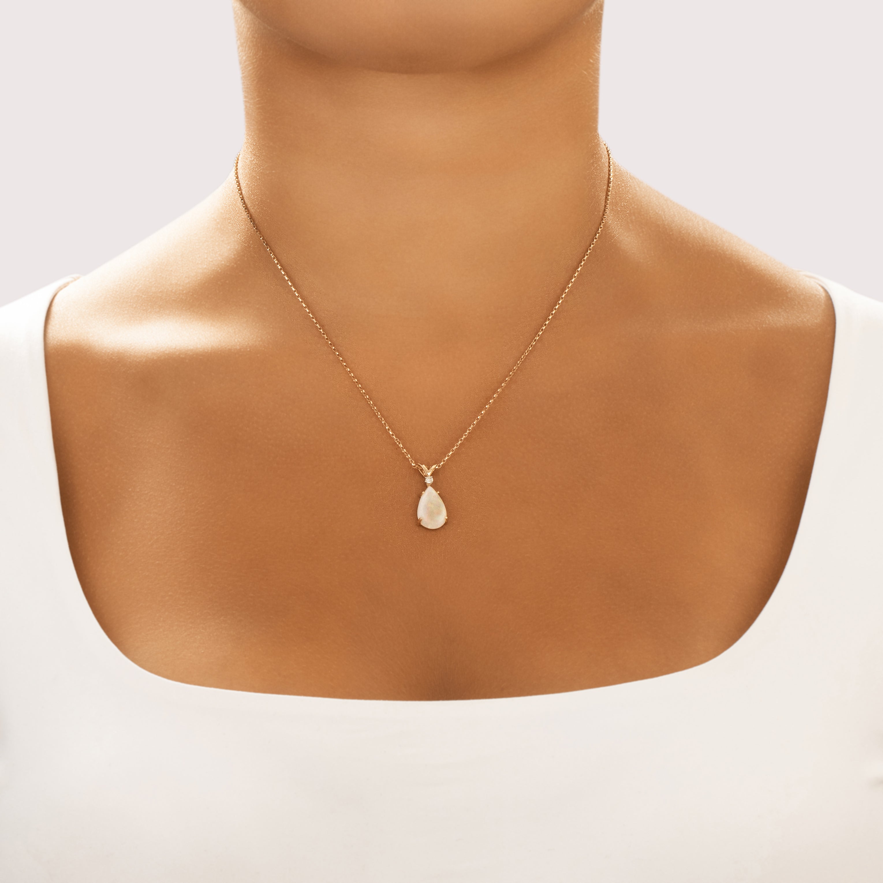 Vintage Church & Company 14k Yellow Gold 2.24ct Opal Diamond Iridescent Pear Cabochon Pendant - On model view