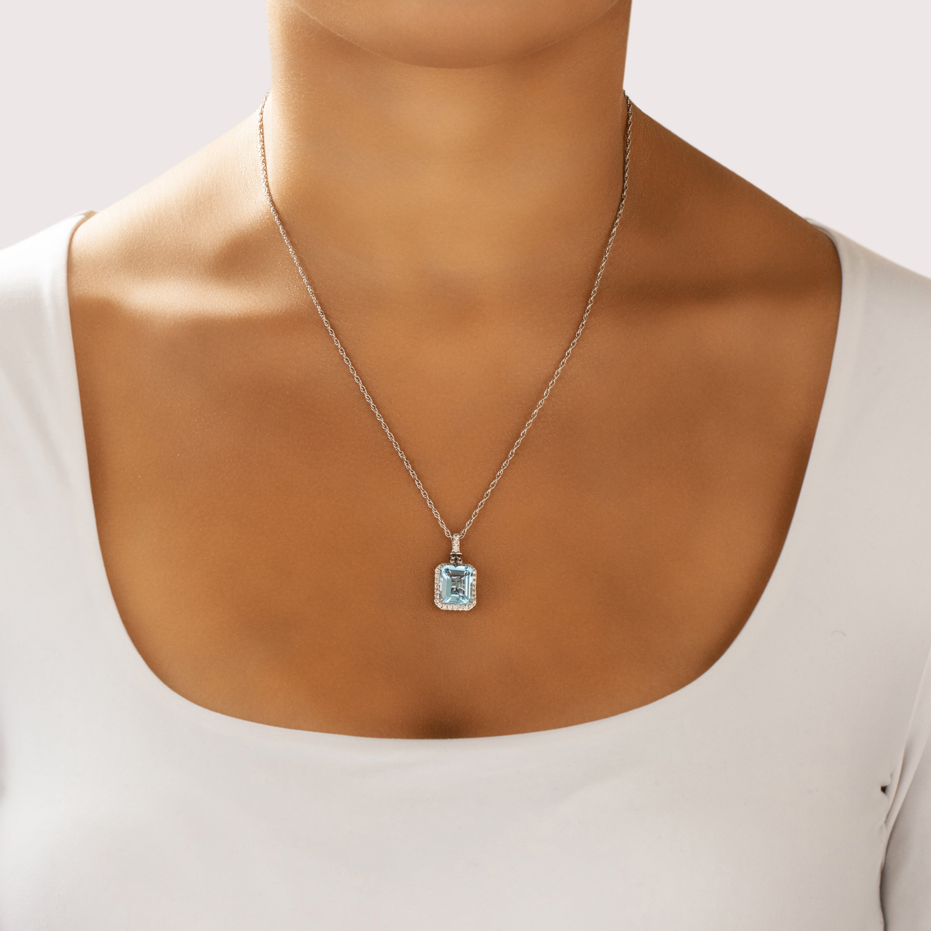 Estate 14k White Gold 6.4ct Blue Topaz Champagne Diamond Chocolate Diamond Sophisticated Adorned Halo Pendant - On model view