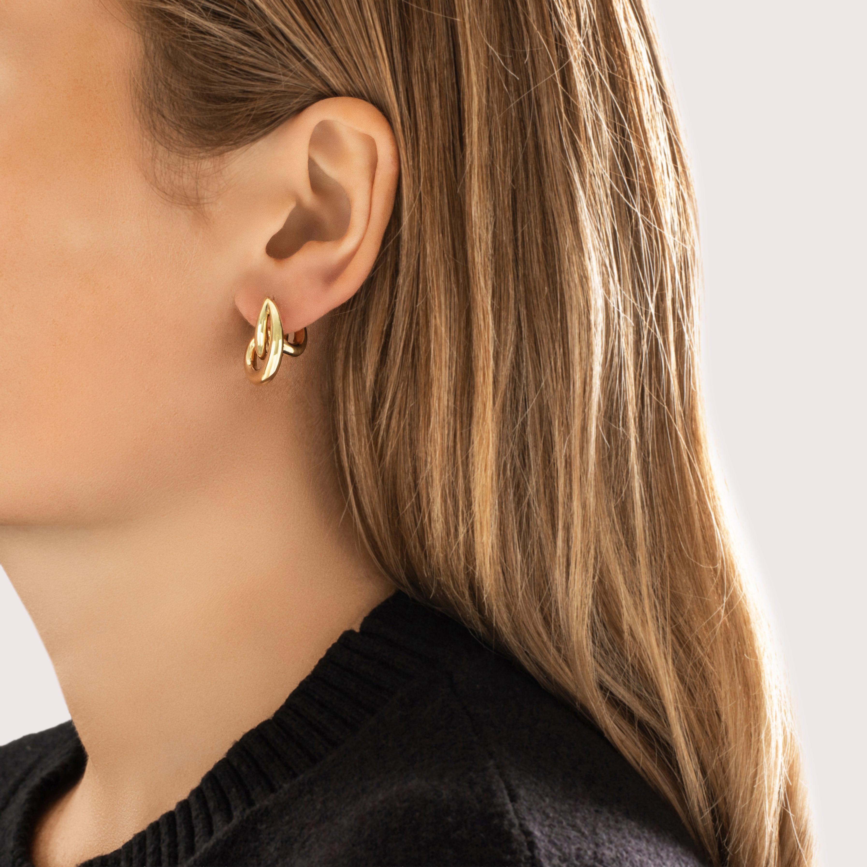 Vintage 14k Yellow Gold Gleaming Looping Hoop Earrings - On model view