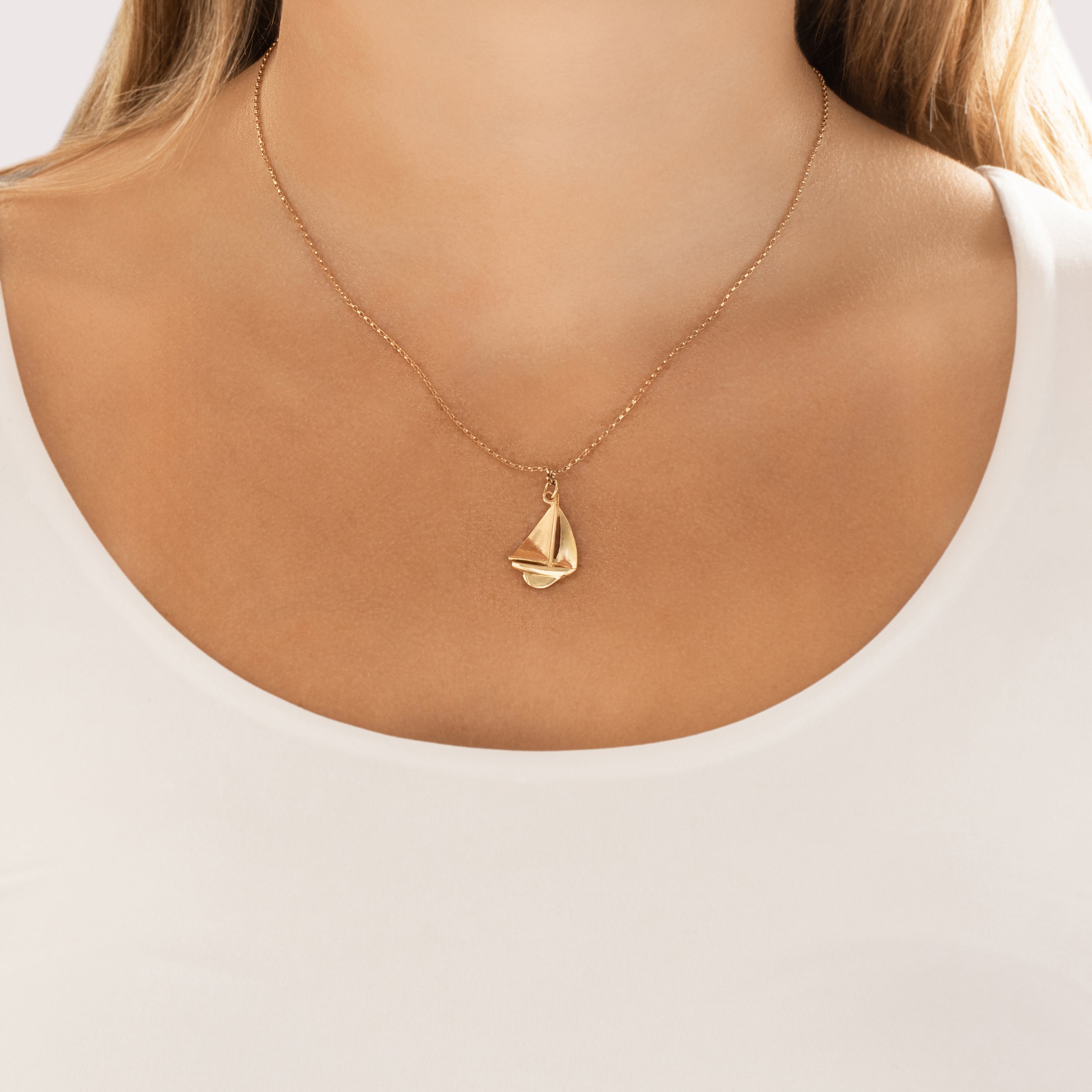 Vintage 14k Yellow Gold Gleaming Classic Sailboat Charm / Pendant - On model view