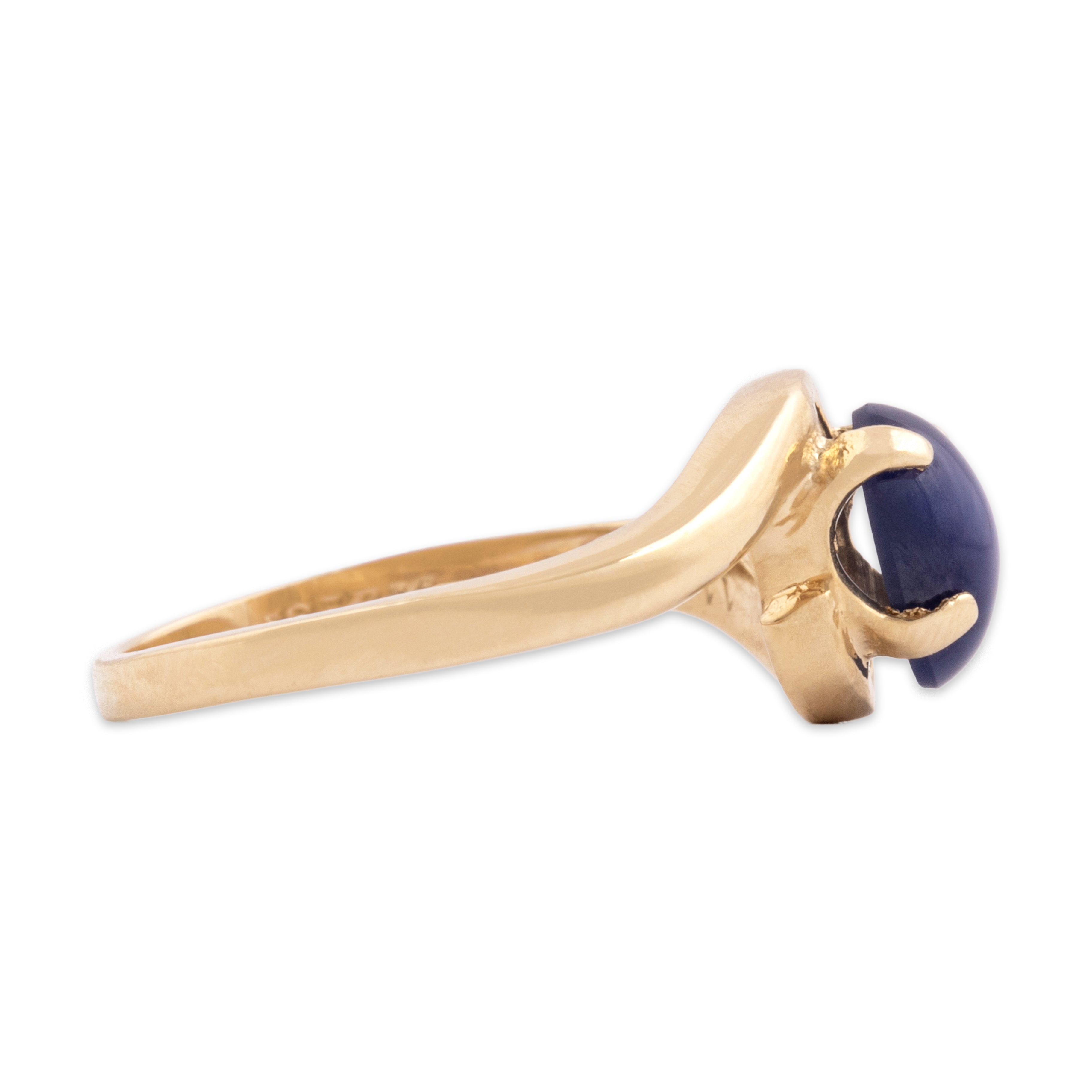 Vintage 14k Yellow Gold .96ct Synthetic Blue Star Sapphire Flashing Wavy Bypass Ring - Side view