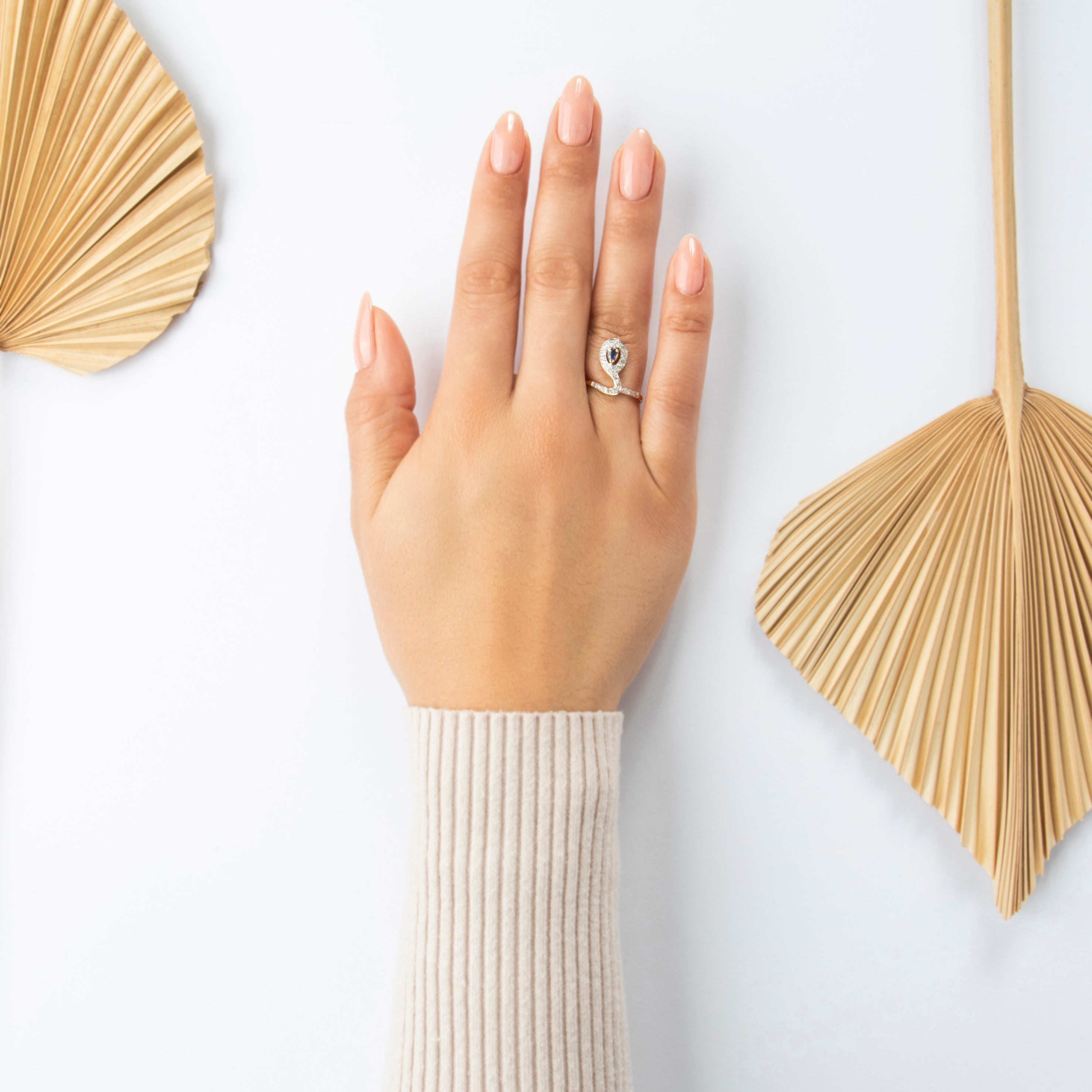 Vintage 14k Yellow Gold Blue Sapphire Diamond Swirling Vertical Halo Ring - On model view