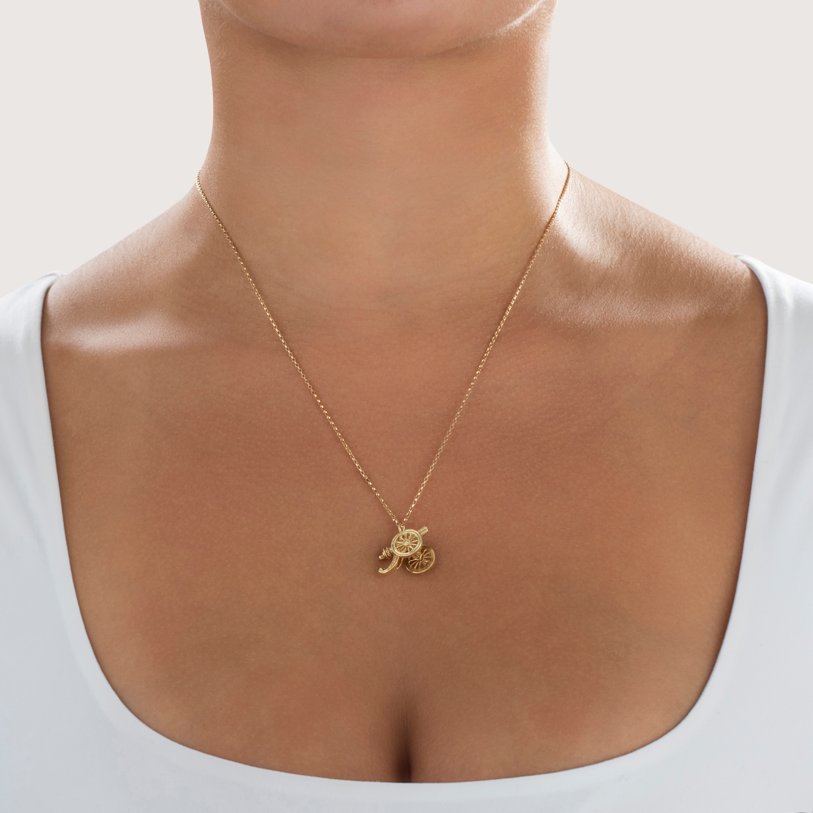 Vintage Heavy 14k Yellow Gold Wonderful Detailed Rolling Cannon Charm / Pendant - On model view