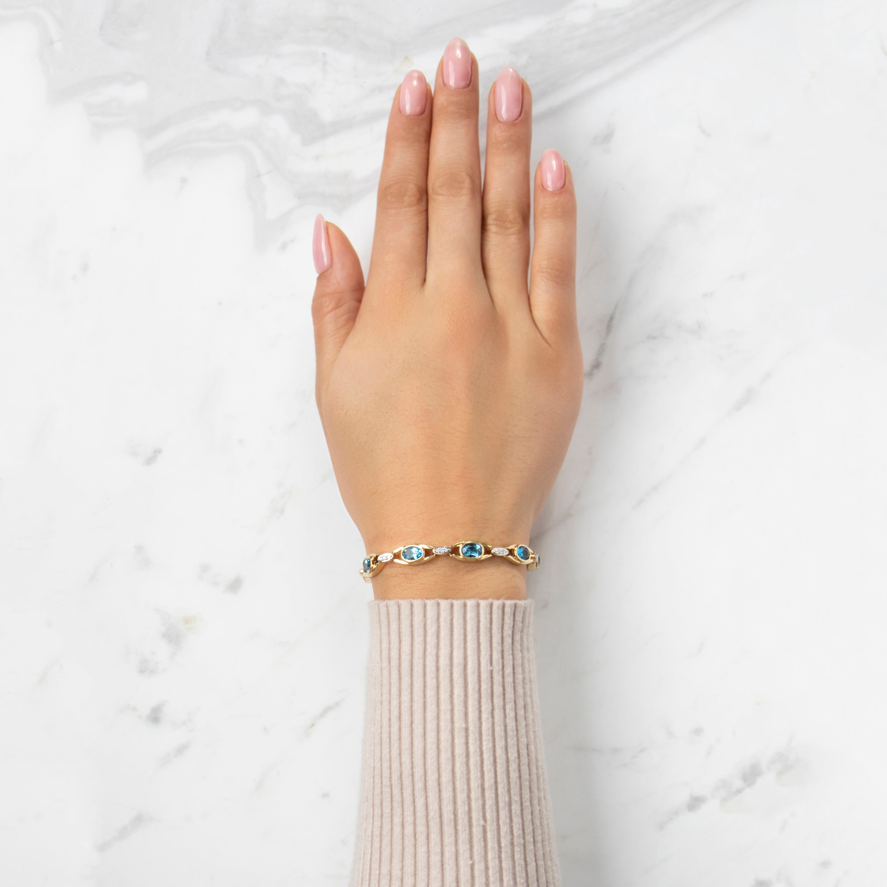 Vintage 14k Yellow Gold 9cttw Blue Topaz Diamond Gleaming Bezel Bracelet - On model view