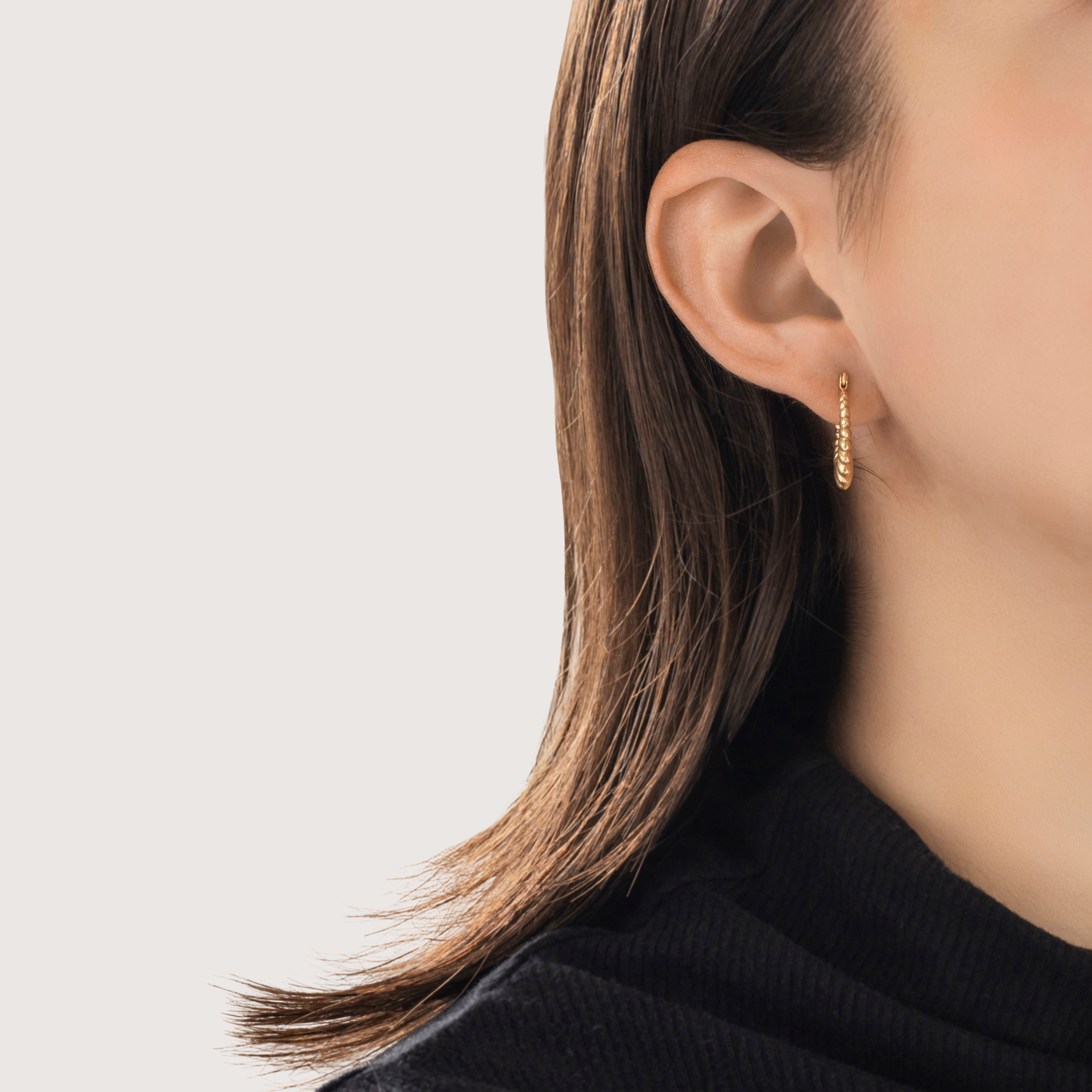 Vintage Small 14k Yellow Gold Chic Ribbed Textured Hoop Earrings - On model view