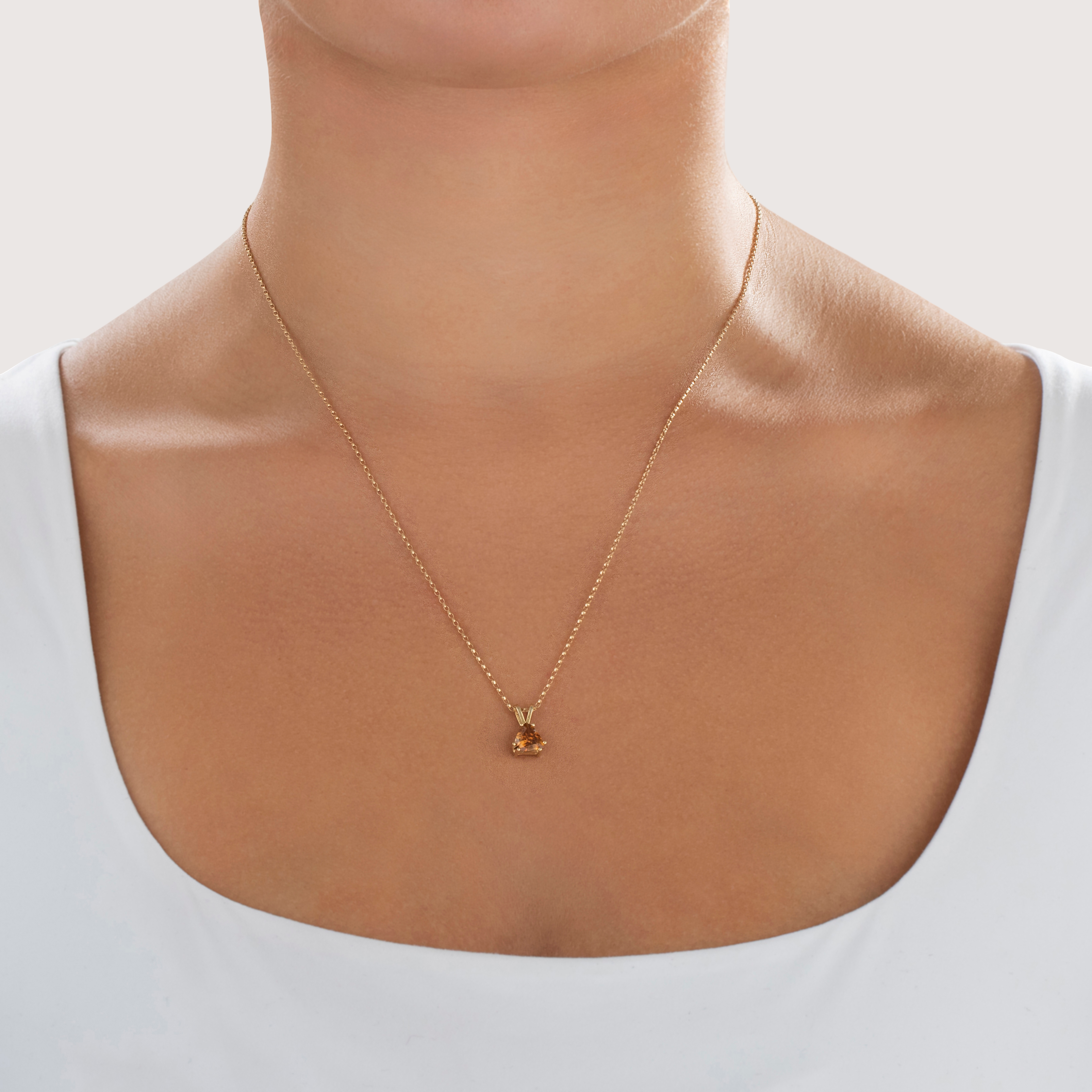 Vintage Small 14k Yellow Gold 1.3ct Brown Zircon Dazzling Trilliant Pendant - On model view