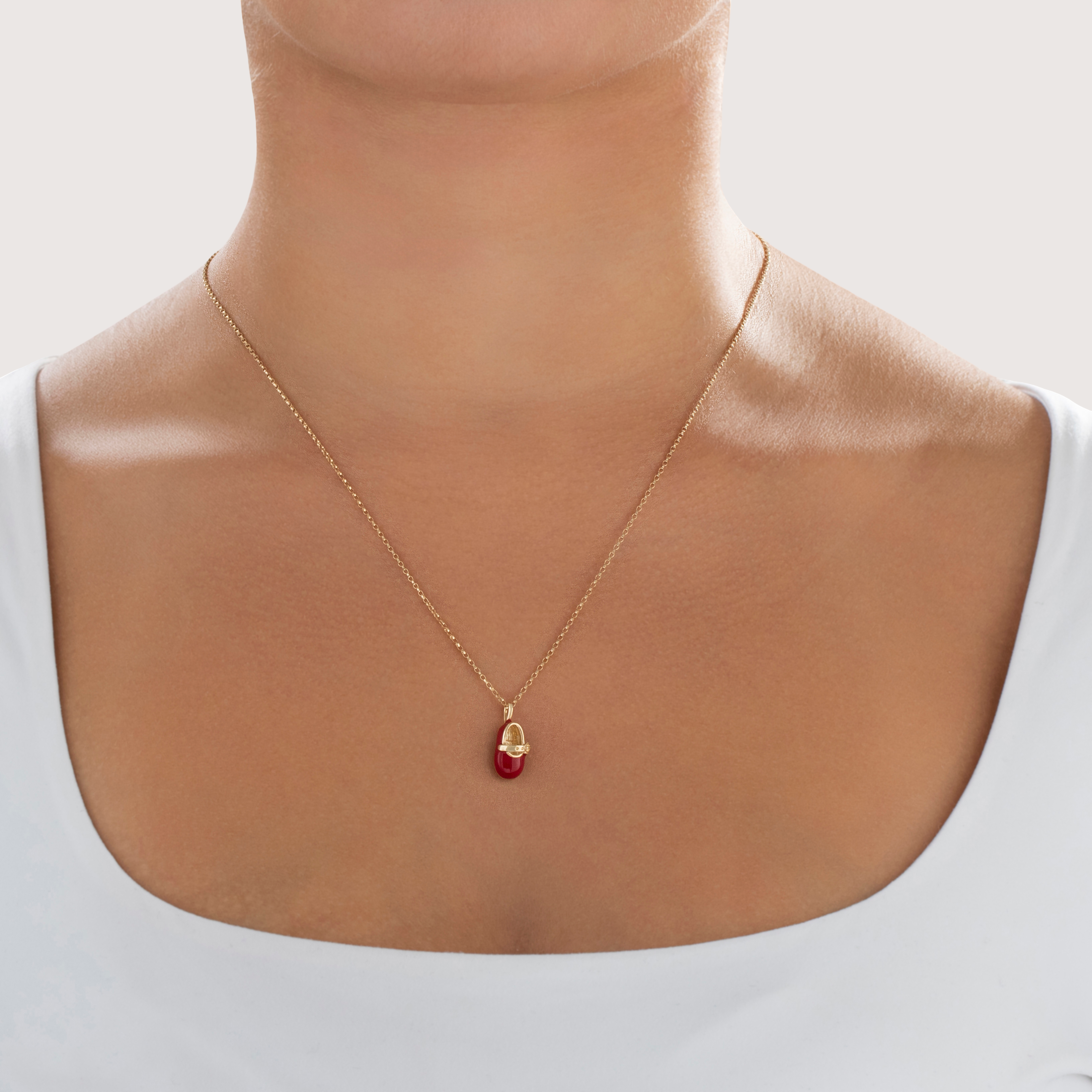 Vintage 10k Yellow Gold Cute Red Enamel Baby Shoe Charm / Pendant - On model view