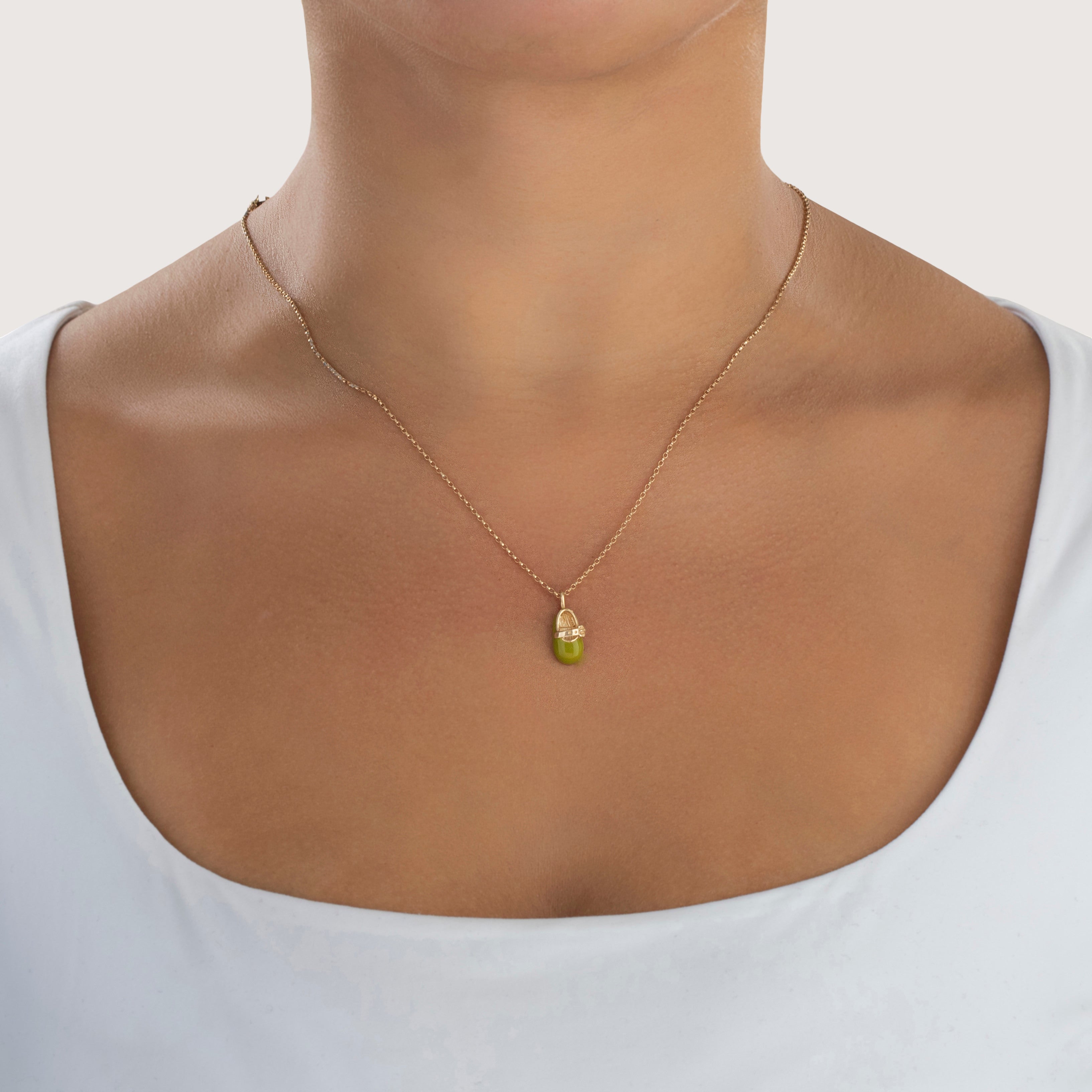 Vintage 10k Yellow Gold Green Enamel Baby Shoe Charm / Pendant - On model view