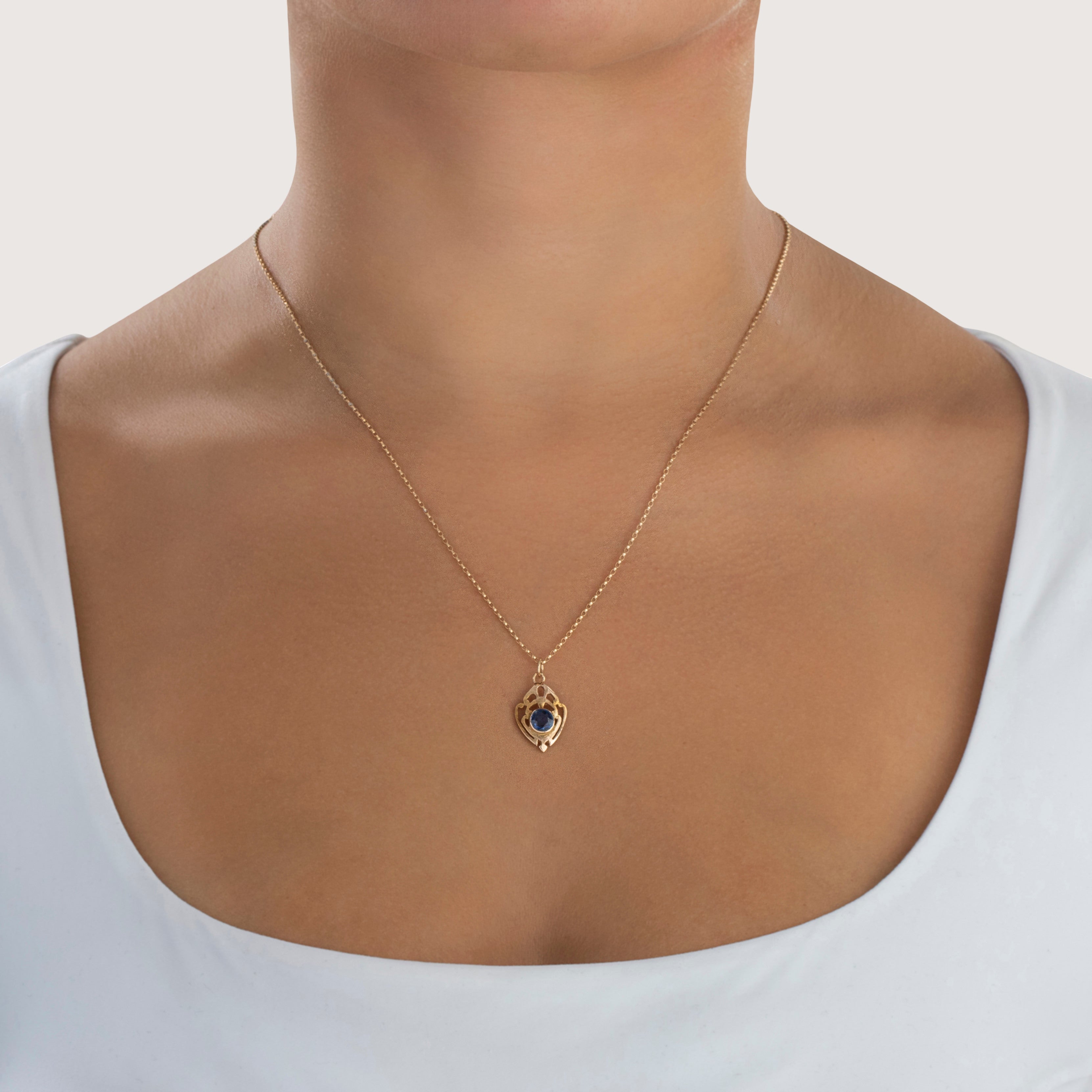 Antique 14k Yellow Gold Blue Synthetic Sapphire Regal Charm / Pendant - On model view