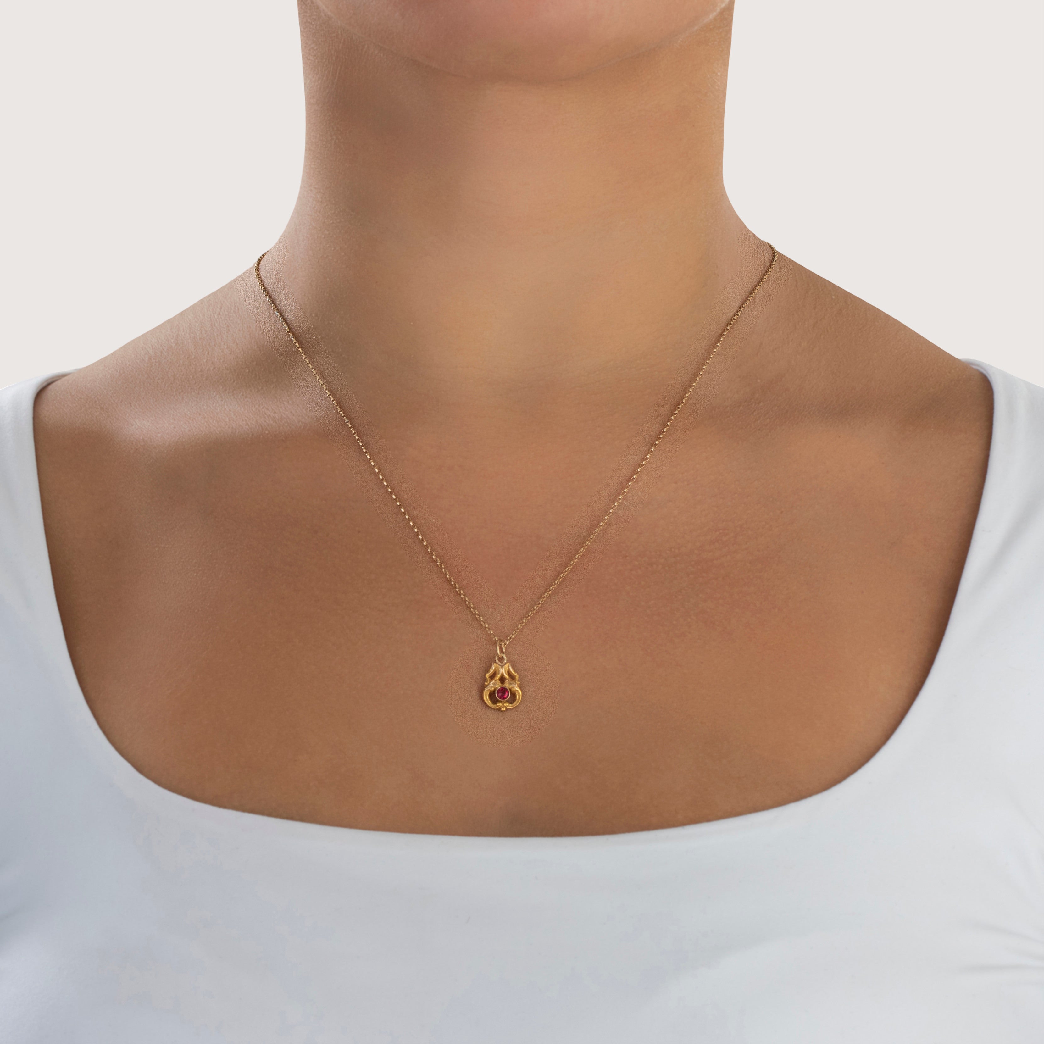 Antique 14k Yellow Gold Pink Glass Satin Flourish Charm / Pendant - On model view