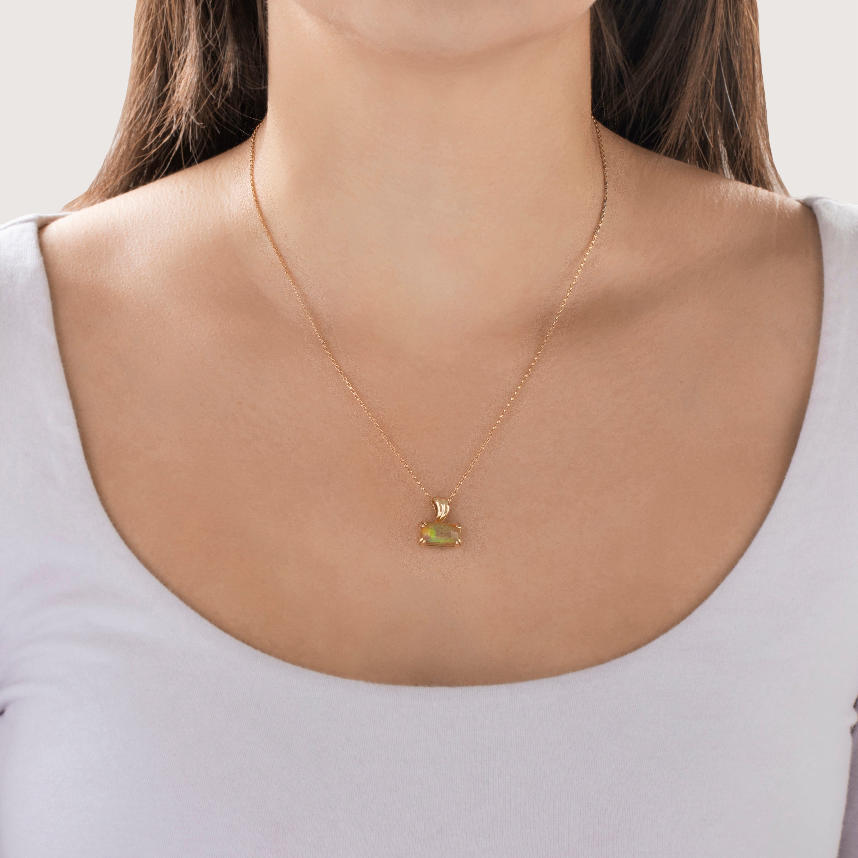 Estate 10k Yellow Gold 2.6ct Jelly Opal Rainbow Flashing East-West Pendant - On model view