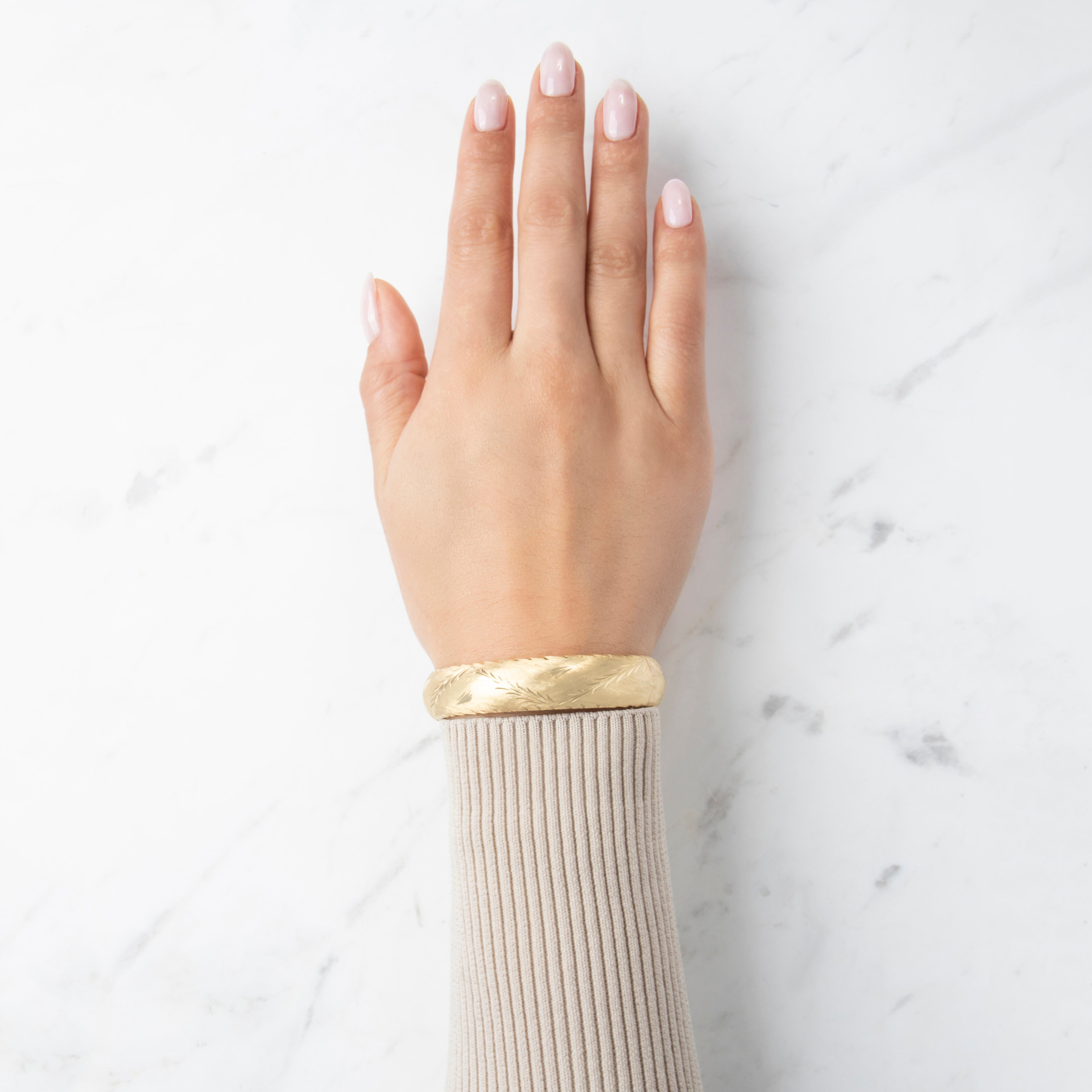 Vintage 14k Yellow Gold Brushed Leaf Bangle Bracelet - On model view