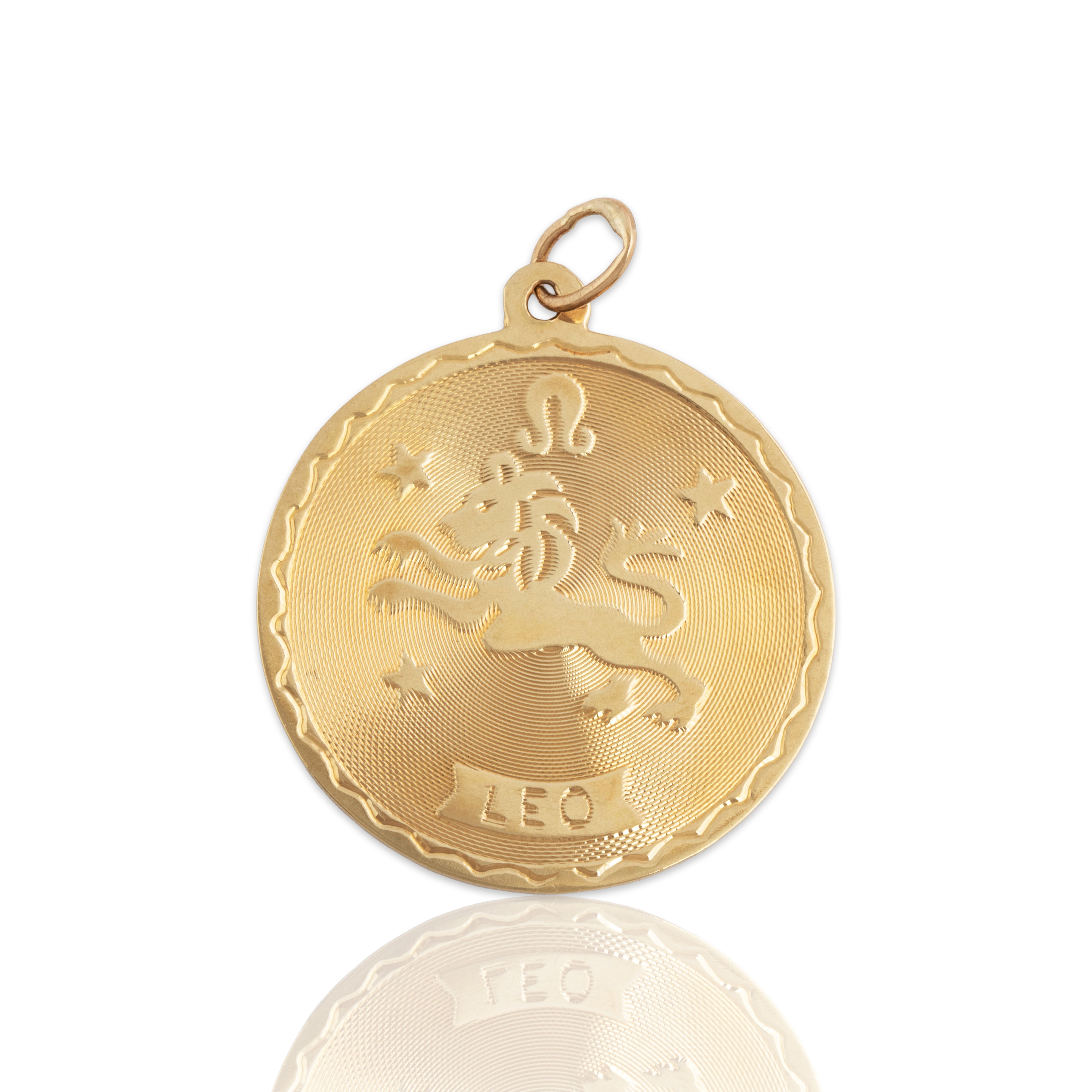 Vintage Large Lightweight 14k Yellow Gold Textured Leo Zodiac Medallion Pendant - Close-up view