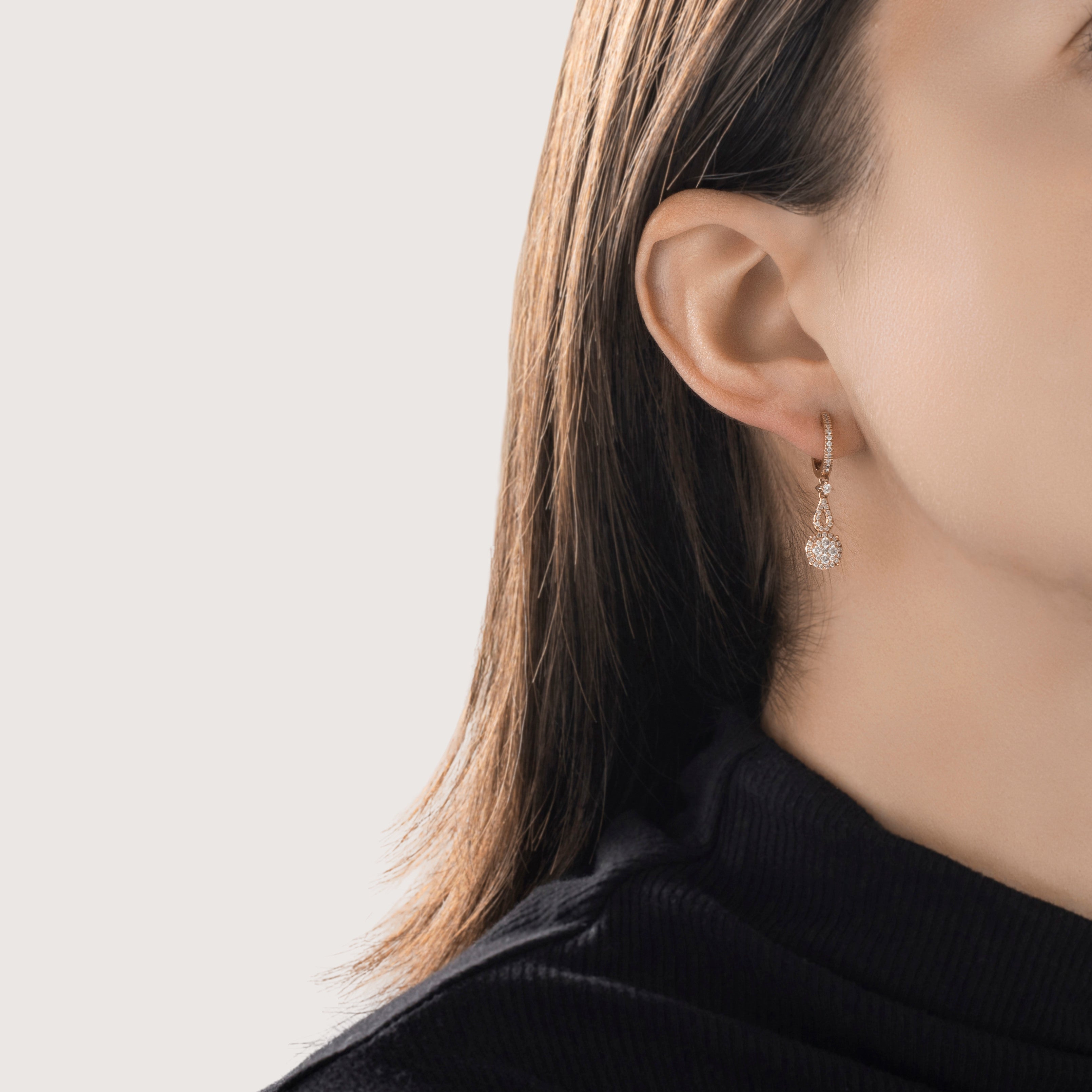 Estate 14k Rose Gold .682cttw Diamond Sophisticated Halo Dangle Earrings - On model view