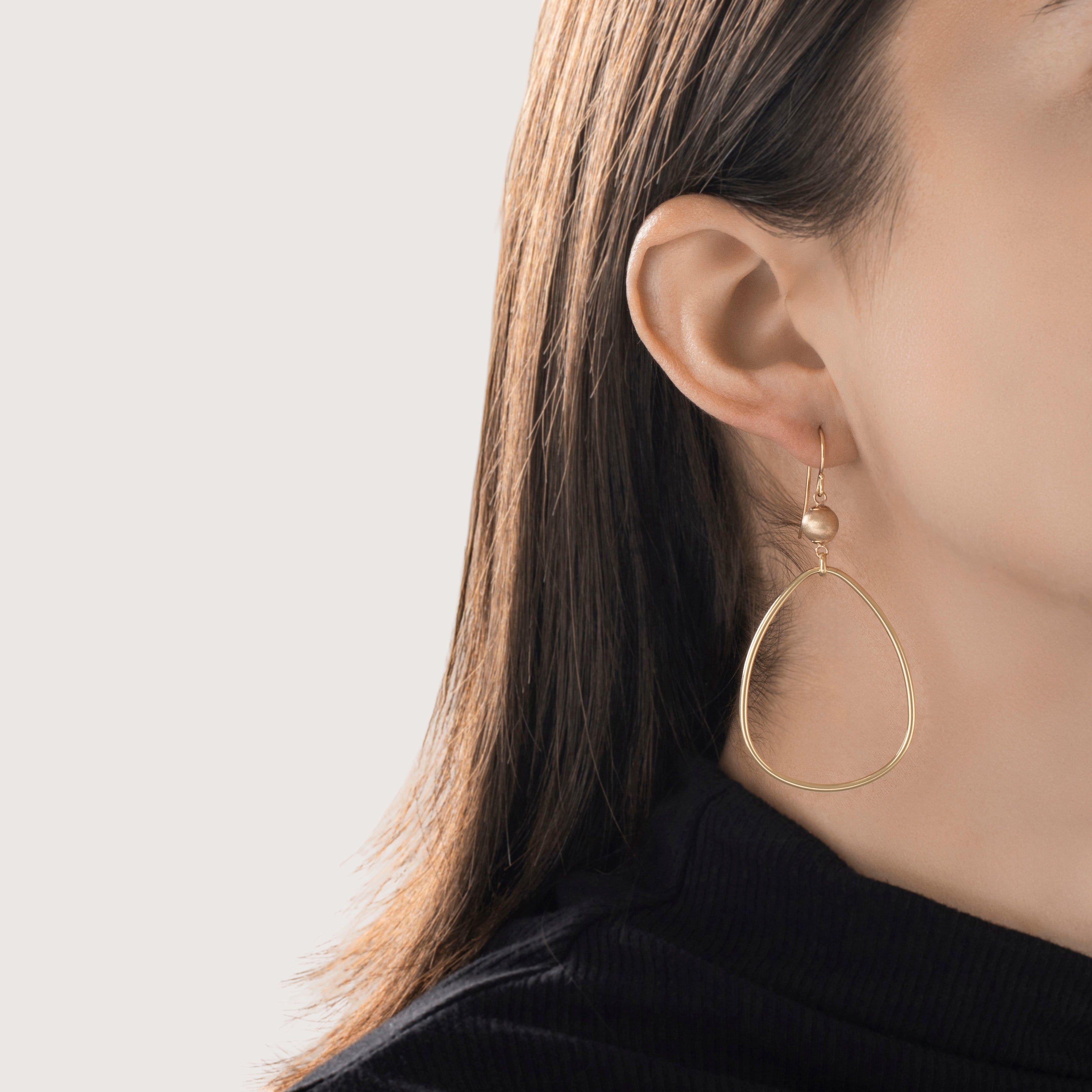 Vintage Large 14k Yellow Gold Wonderful Teardrop Dangle Earrings - On model view