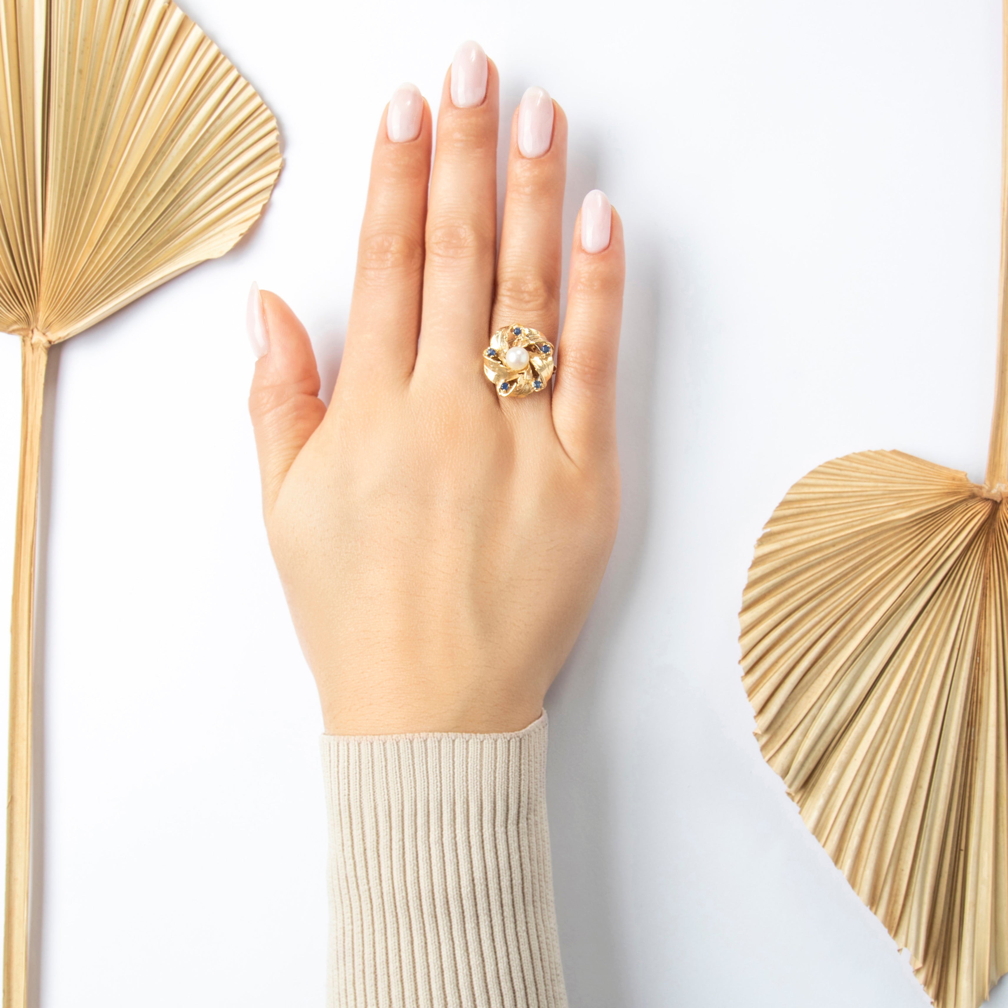 Vintage 14k Yellow Gold Pearl Blue Sapphire Foliate Pinwheel Ring - On model view