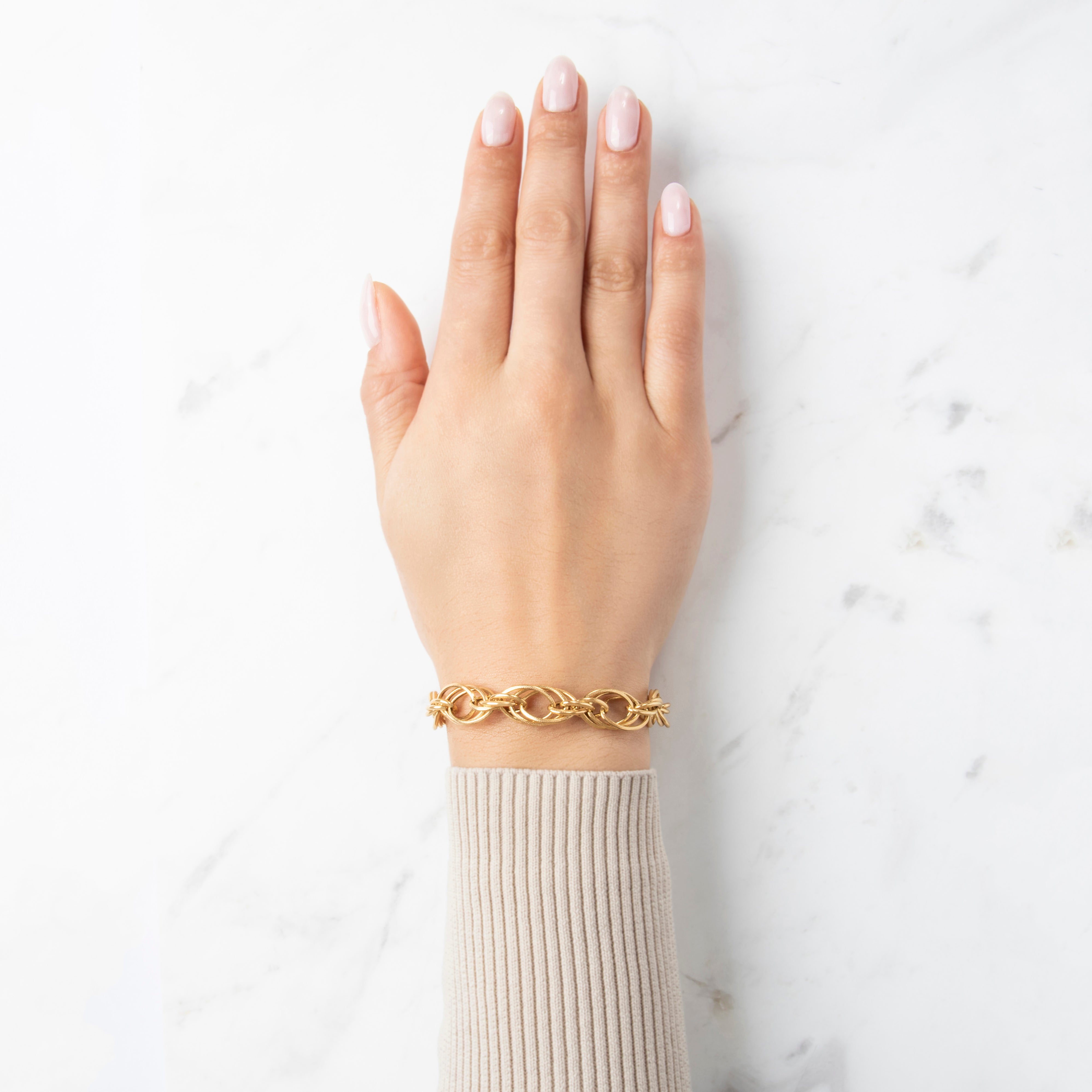 Vintage Italian Lightweight 14k Yellow Gold Twisted Triple Oval Link Bracelet - On model view