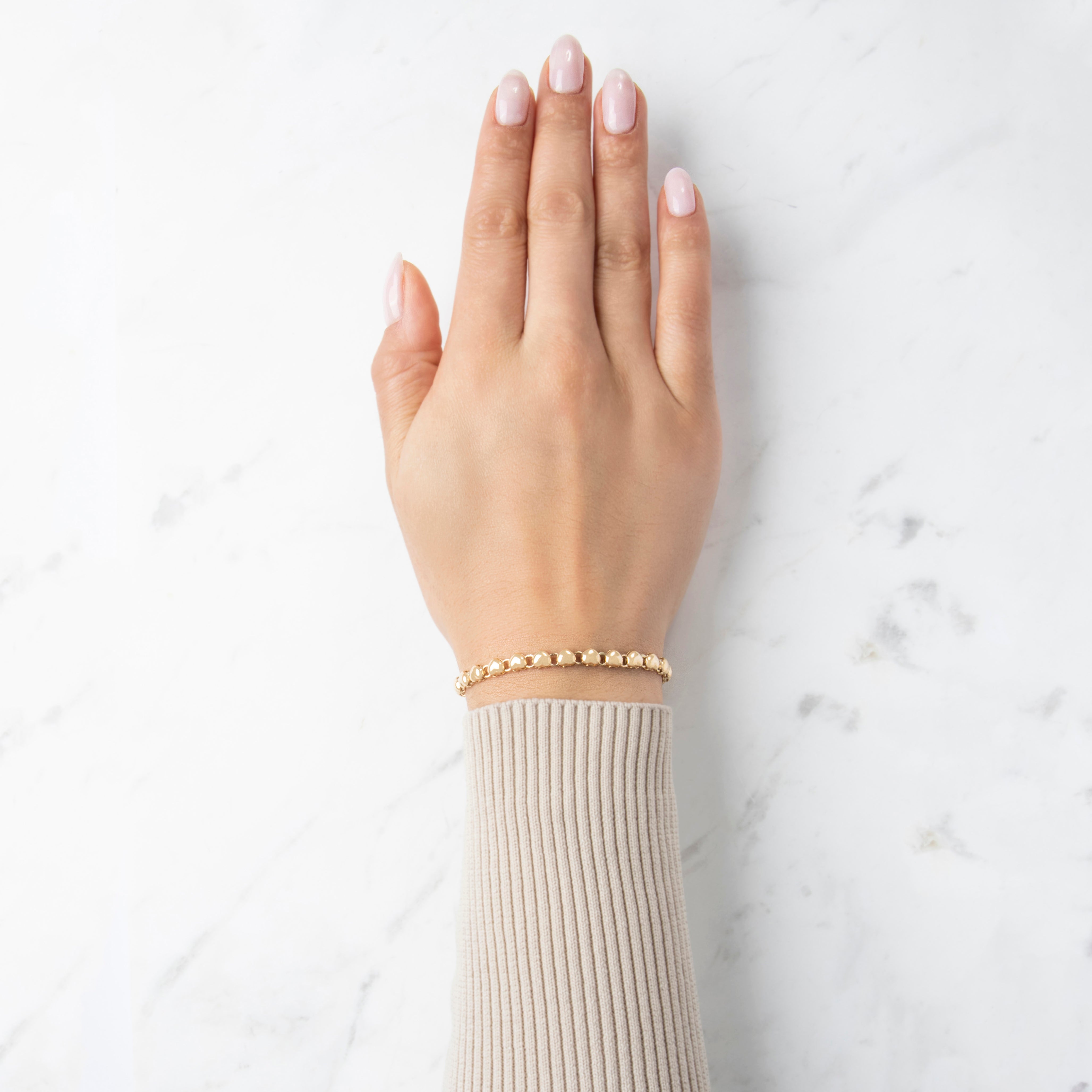 Vintage Italian 14k Yellow Gold Adorable Puffy Heart Bracelet - On model view