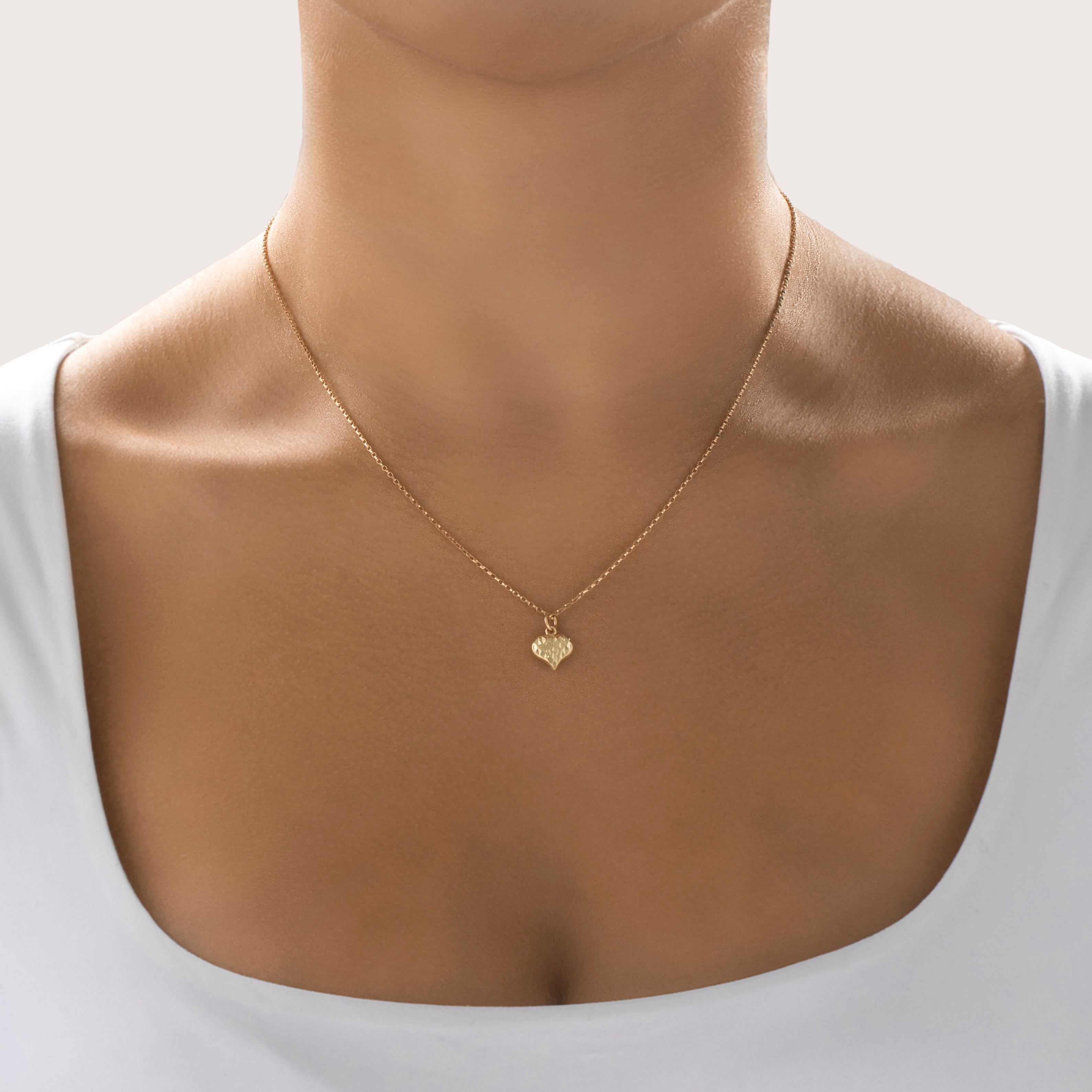 Vintage Lightweight 14k Yellow Gold Pretty Textured Puffy Heart Charm / Pendant - On model view