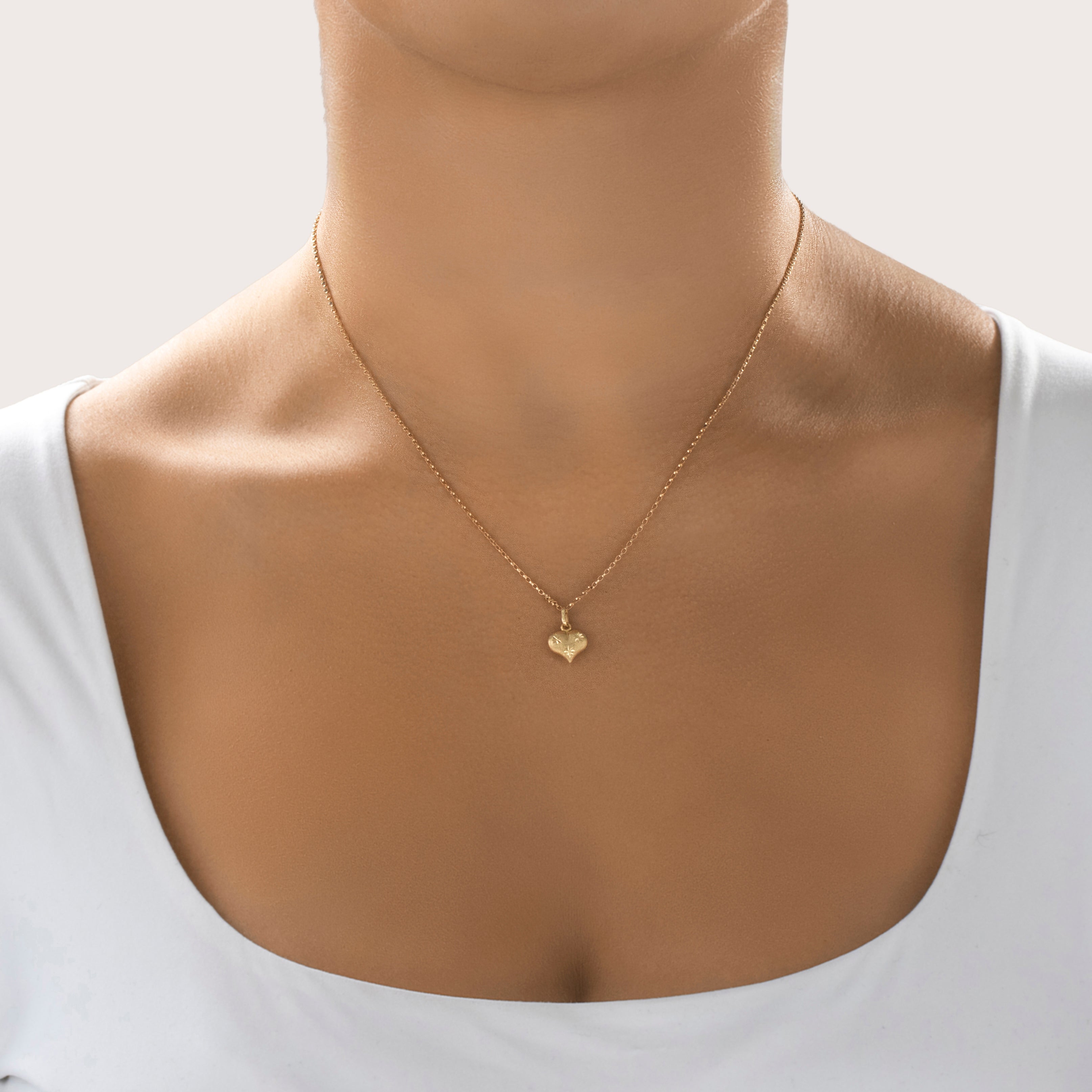 Vintage Small 14k Yellow Gold Lovely Star-Pattern Heart Charm / Pendant - On model view