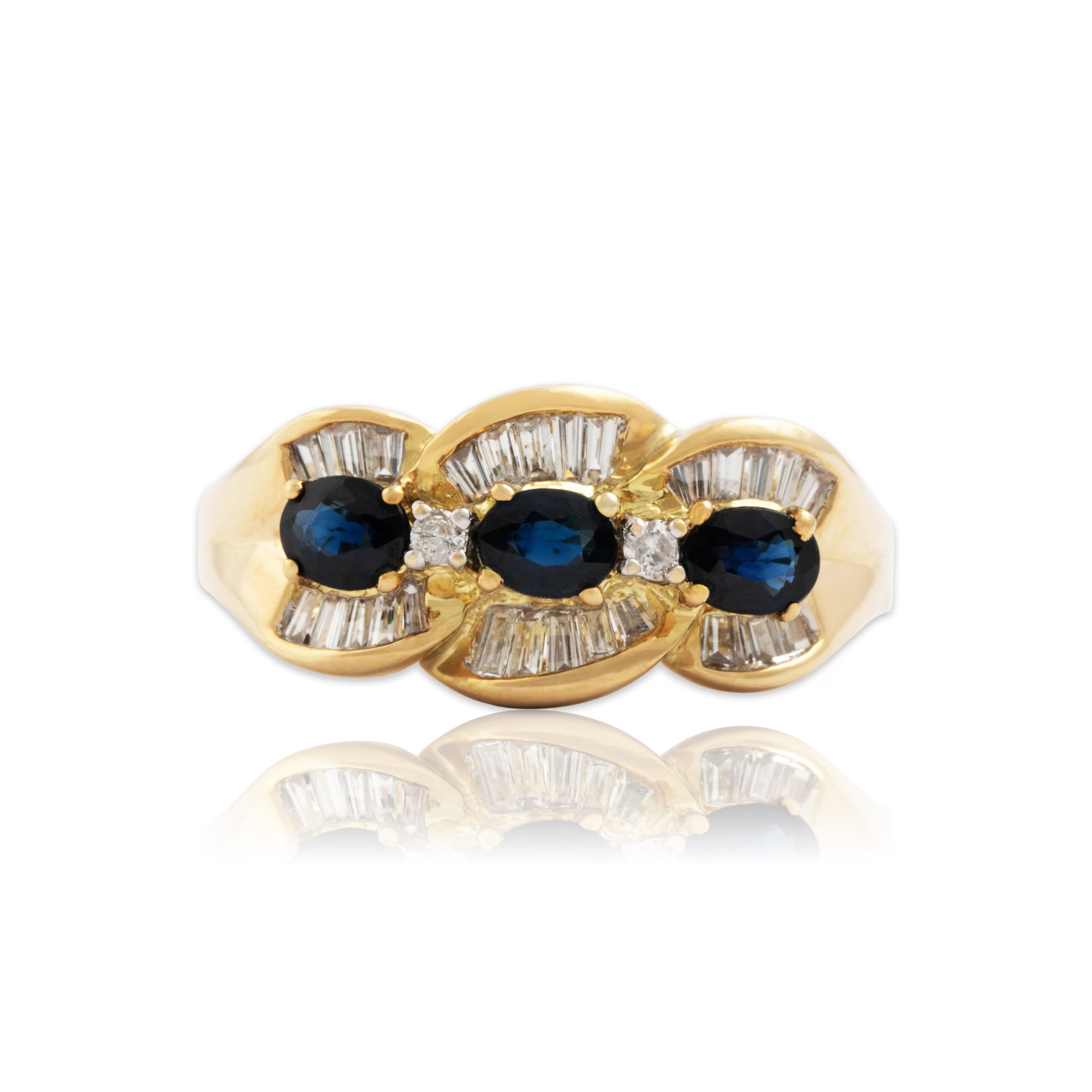 Vintage 14k Yellow Gold Blue Sapphire Diamond Wavy Baguette Halo Ring - Close-up view