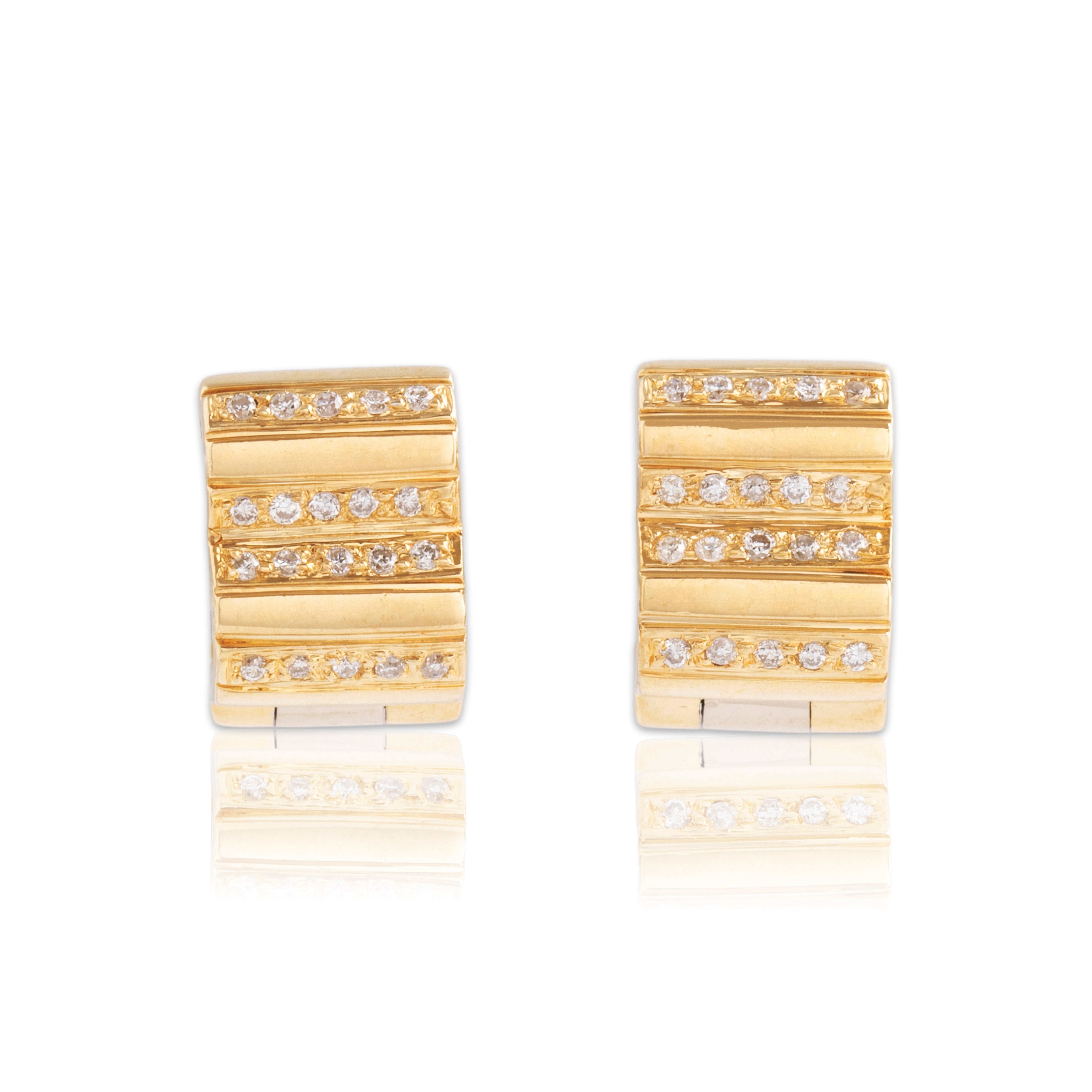 Vintage 18k Yellow & White Gold .2cttw Diamond Lined Quatrefoil Huggie Earrings - Close-up view