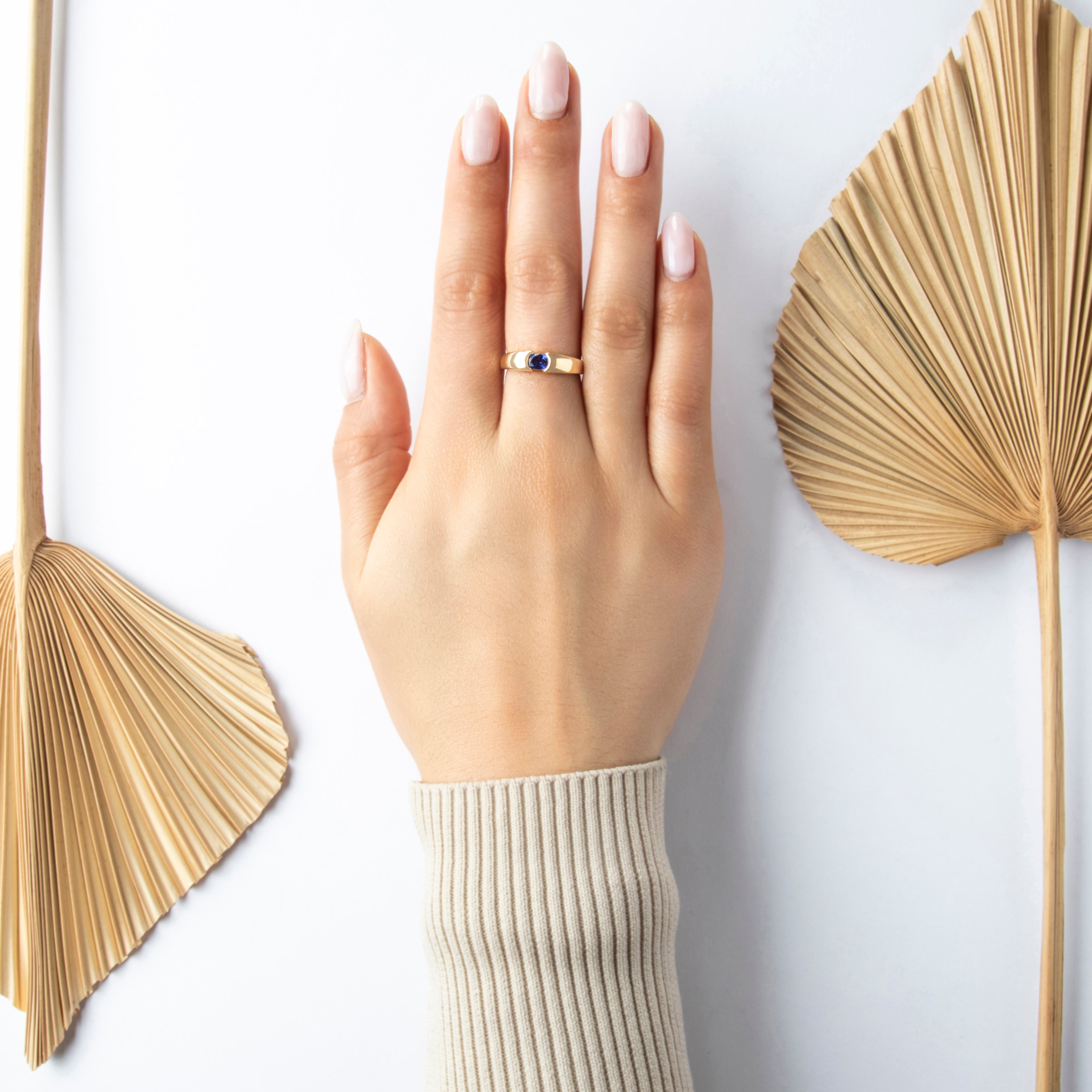 Vintage 14k Yellow Gold Blue Sapphire Sleek East-West Half-Bezel Ring - On model view