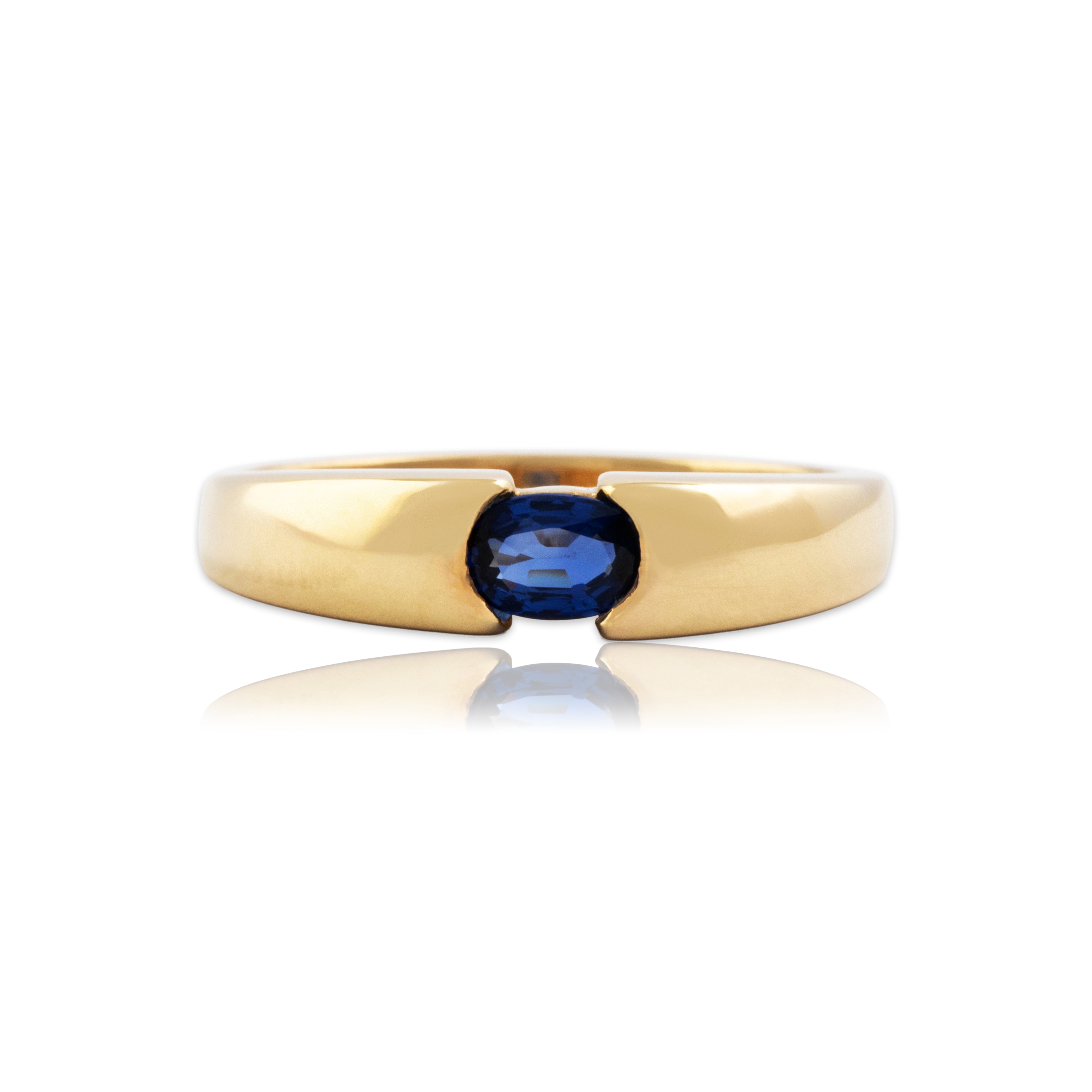 Vintage 14k Yellow Gold Blue Sapphire Sleek East-West Half-Bezel Ring - Close-up view