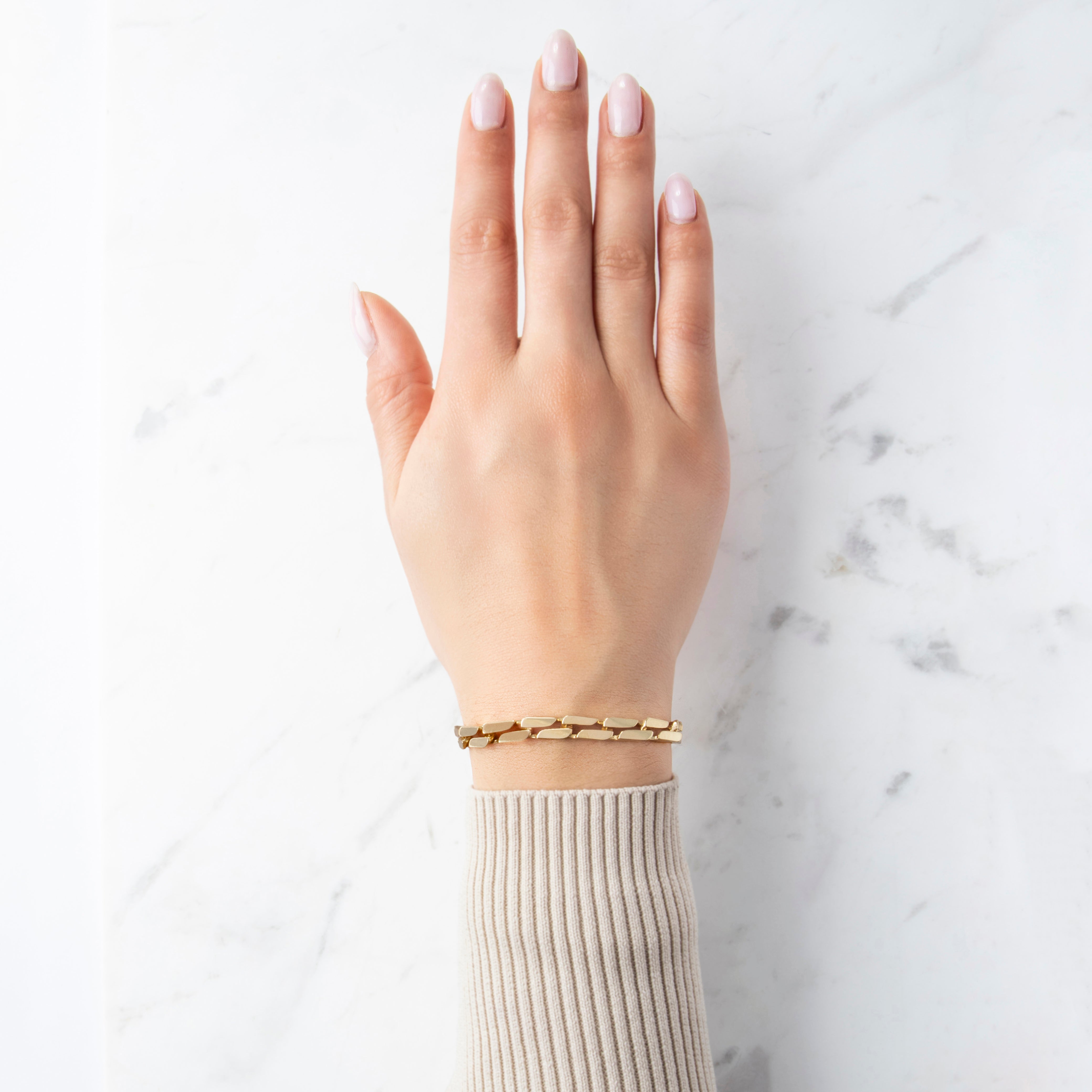 Vintage Heavy 14k Yellow Gold Sleek Flat Staggered Link Bracelet - On model view