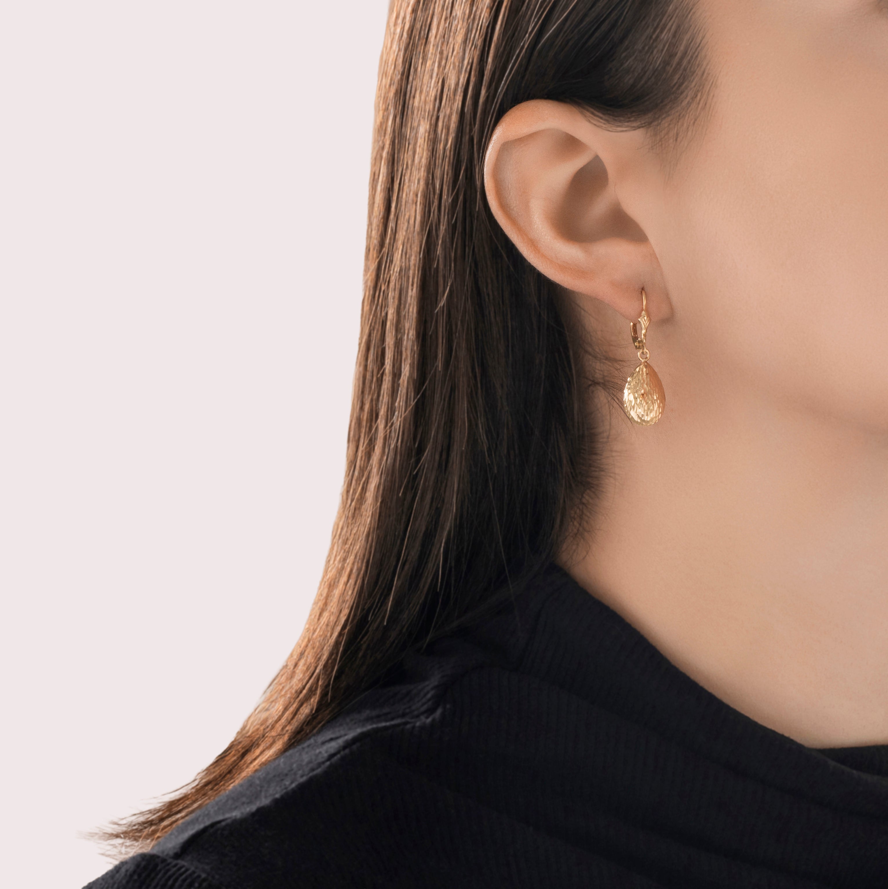 Vintage 14k Yellow Gold Textured Teardrop Dangle Earrings - On model view