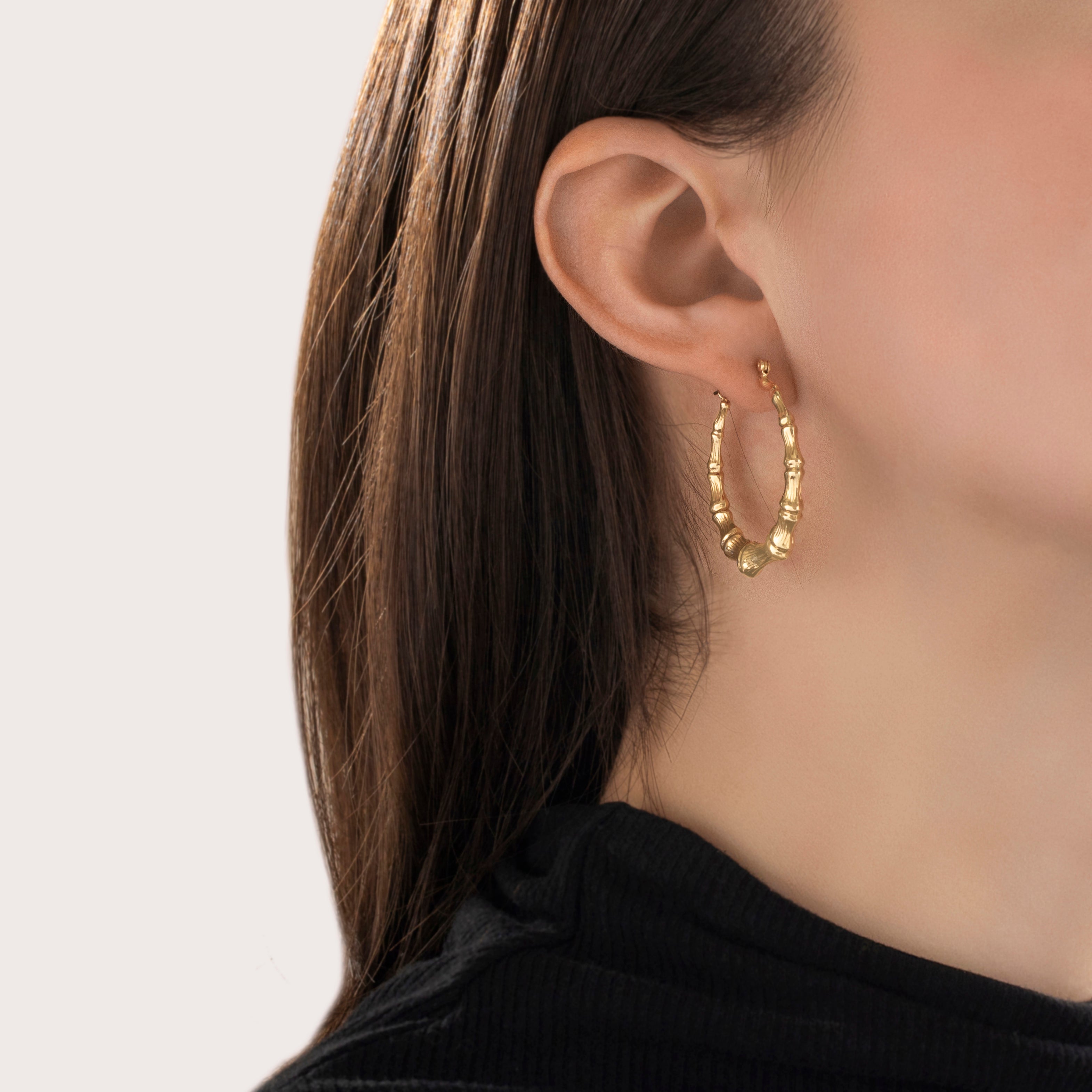 Vintage Large Lightweight 14k Yellow Gold Quintessential Bamboo Hoop Earrings - On model view