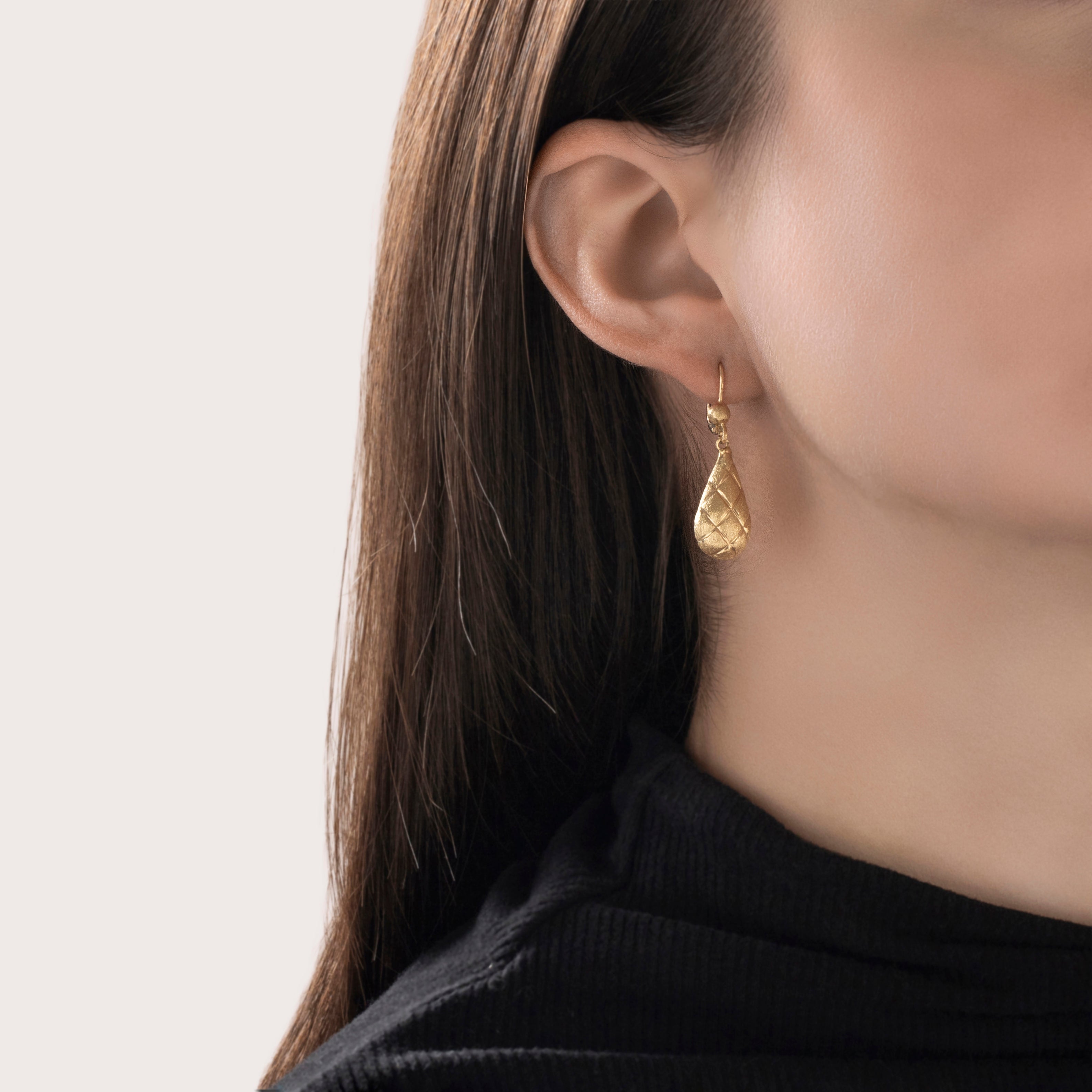 Vintage 14k Yellow Gold Criss-Cross Textured Teardrop Dangle Earrings- On model view