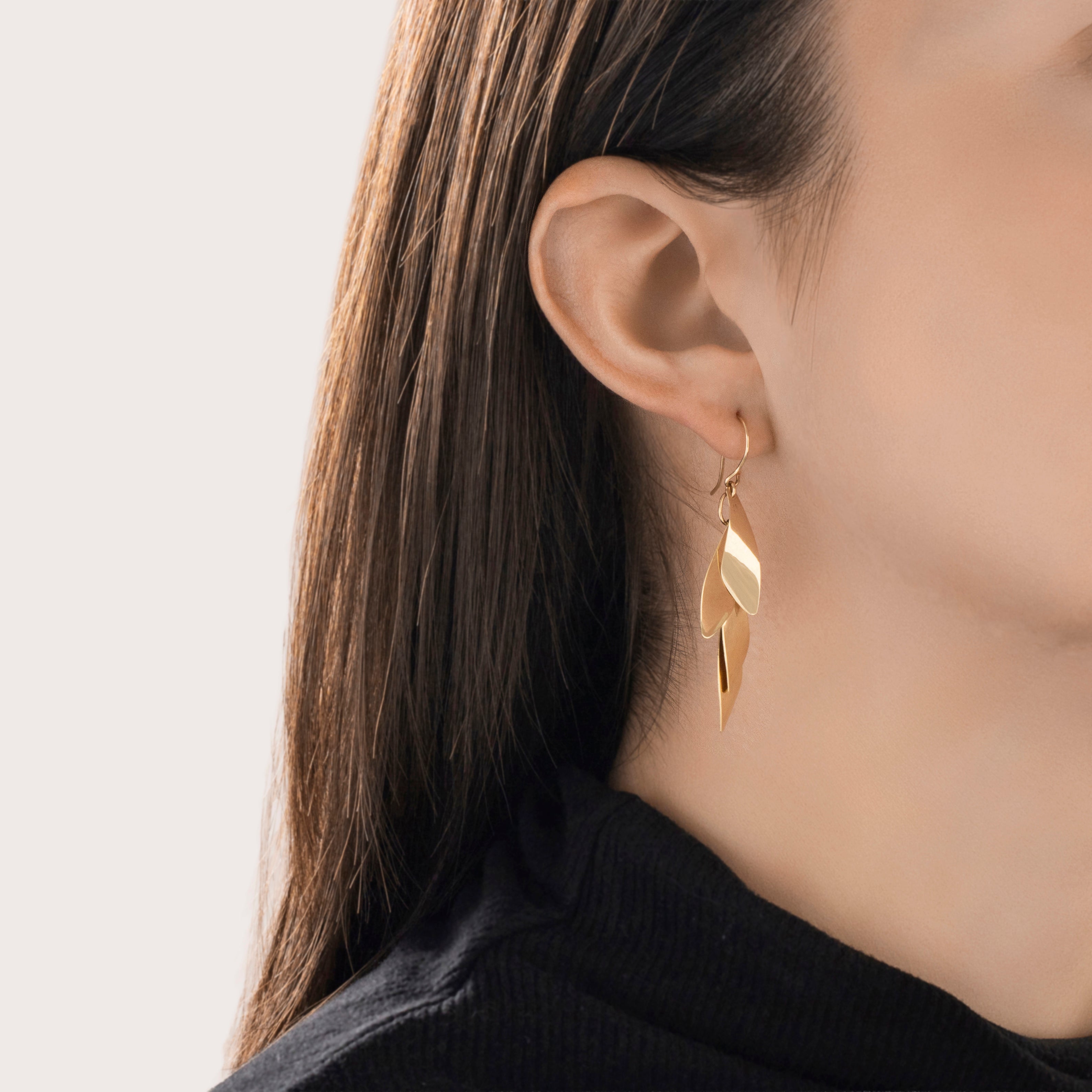 Vintage 14k Yellow Gold Cascading Leaves Dangle Earrings - On model view