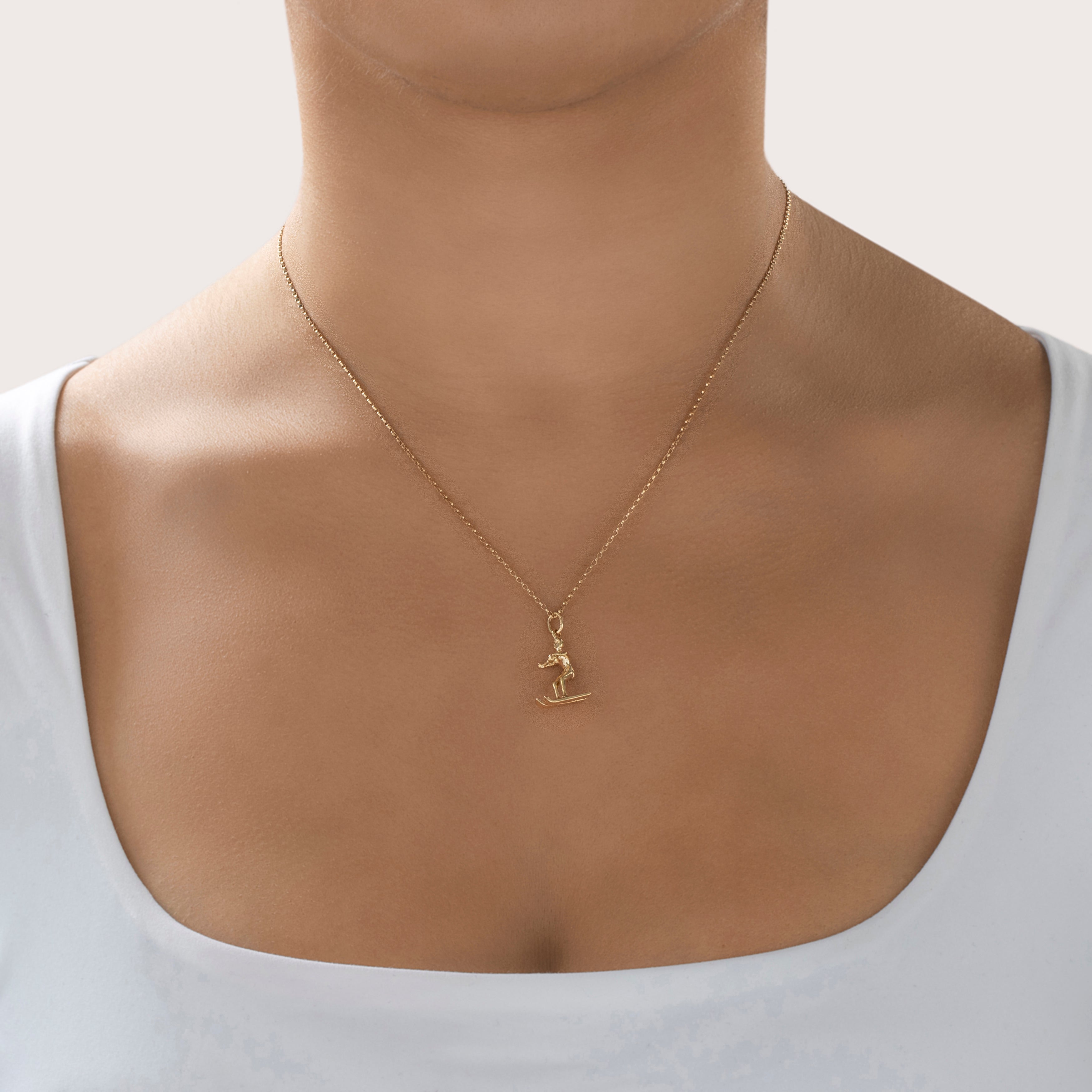 Vintage 14K Yellow Gold Dynamic Water Skier Charm/Pendant - On model view
