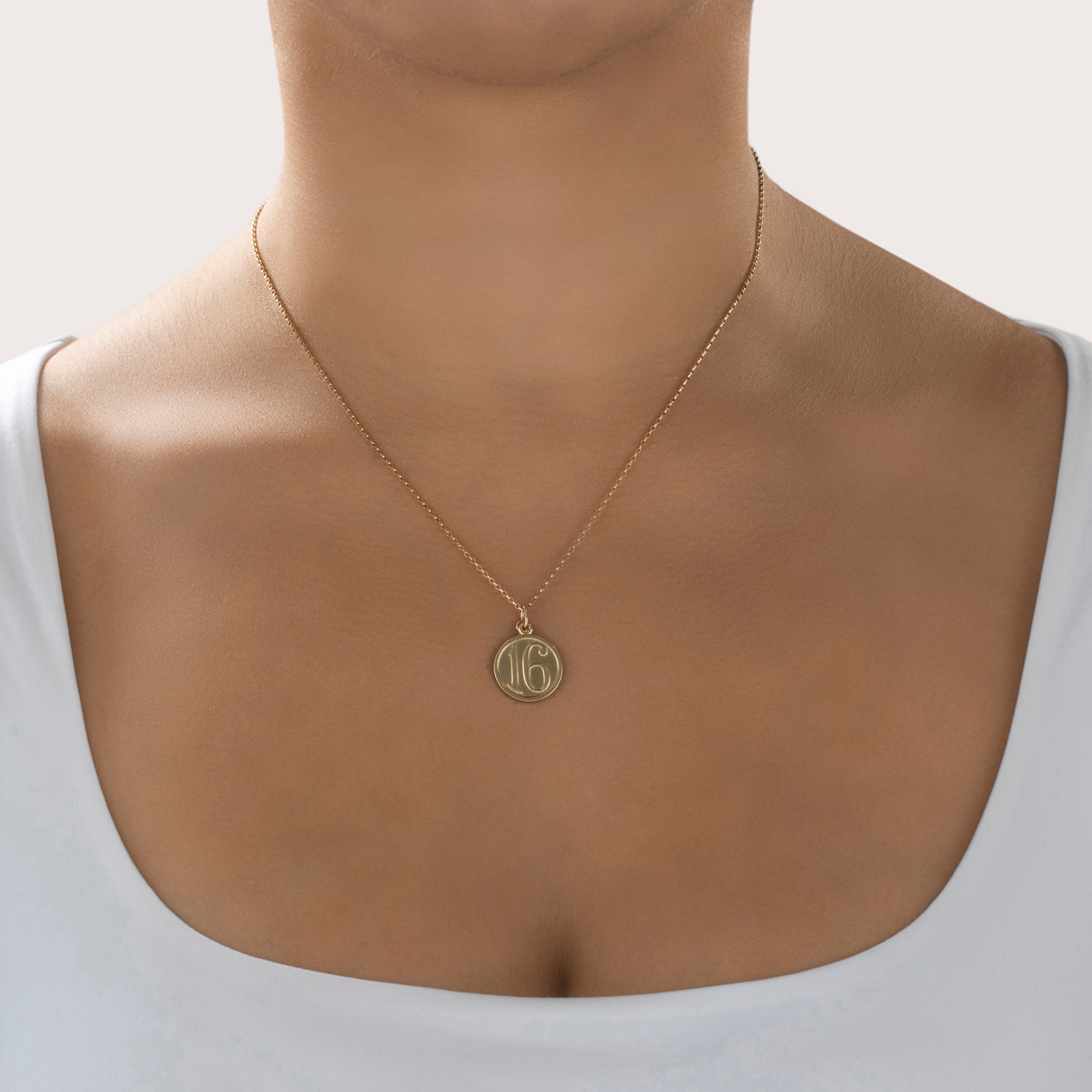 Vintage 14K Yellow Gold Festive Sweet 16 Charm/Pendant - On model view