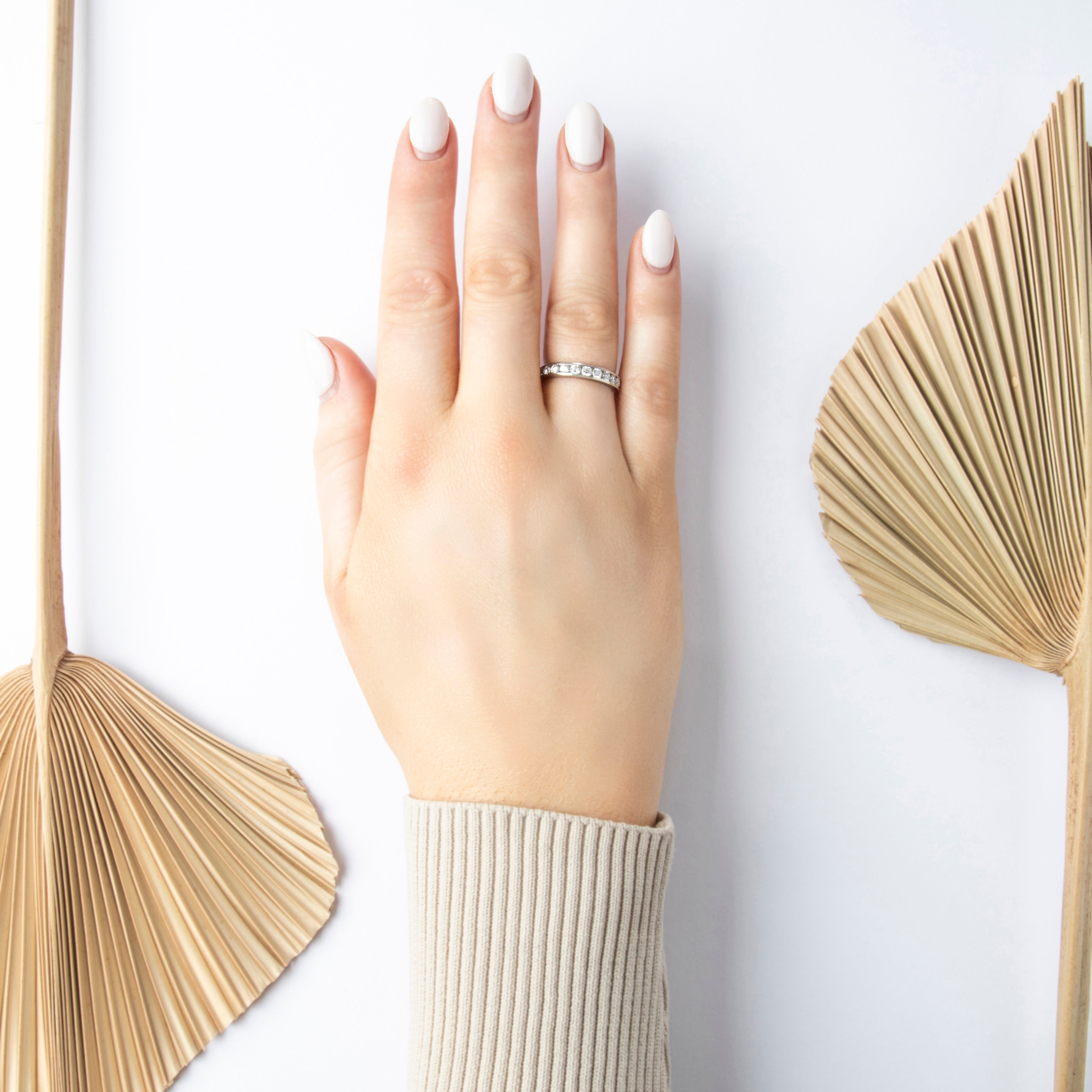 Vintage Platinum .6cttw Diamond Glittering Channel Band Ring - On model view