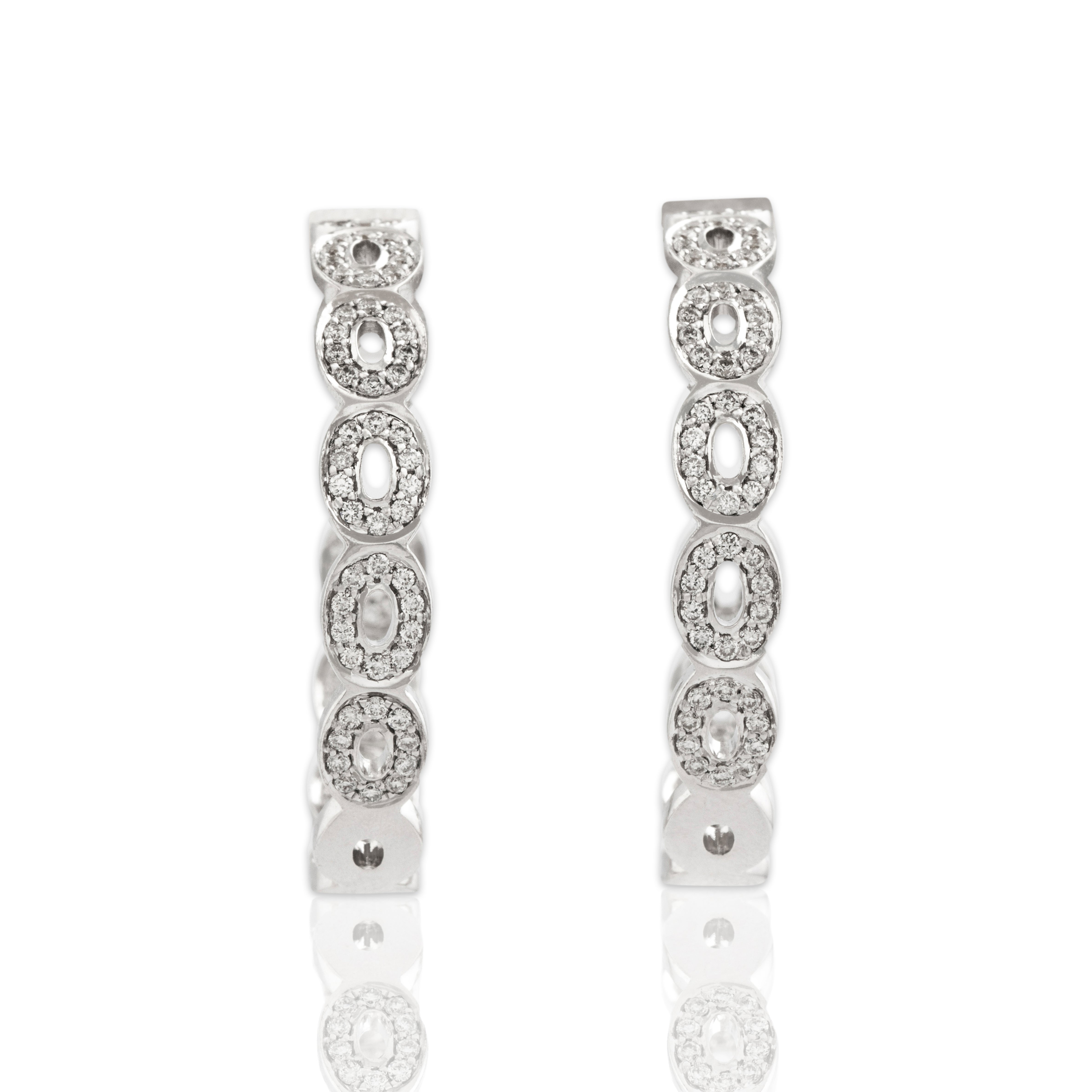 Estate 18K White Gold .94cttw Diamond Inside-Out Oval Hoop Earrings - Close-up view