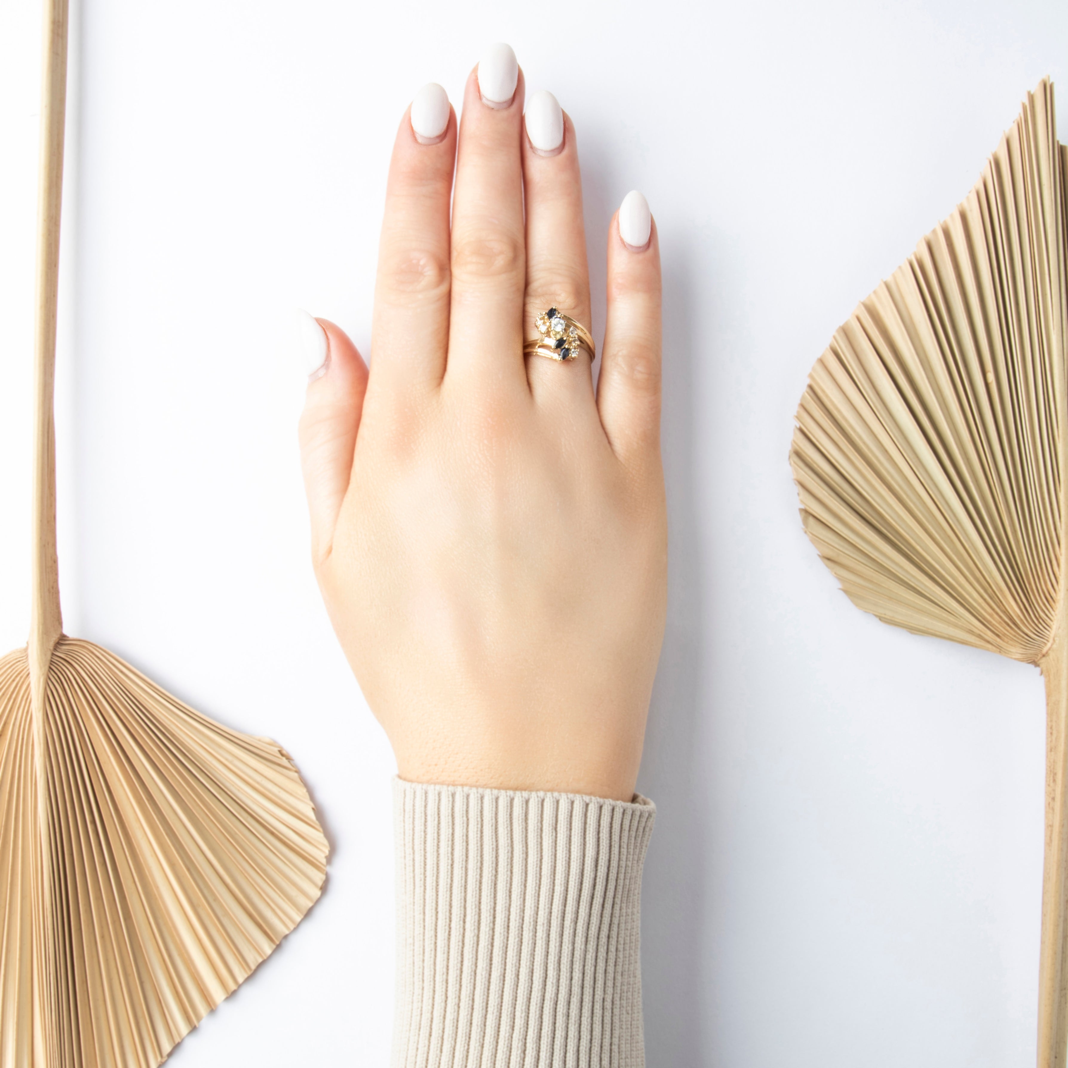 Vintage 14K Yellow Gold .23cttw Blue Sapphire Bypass Ring - On model view