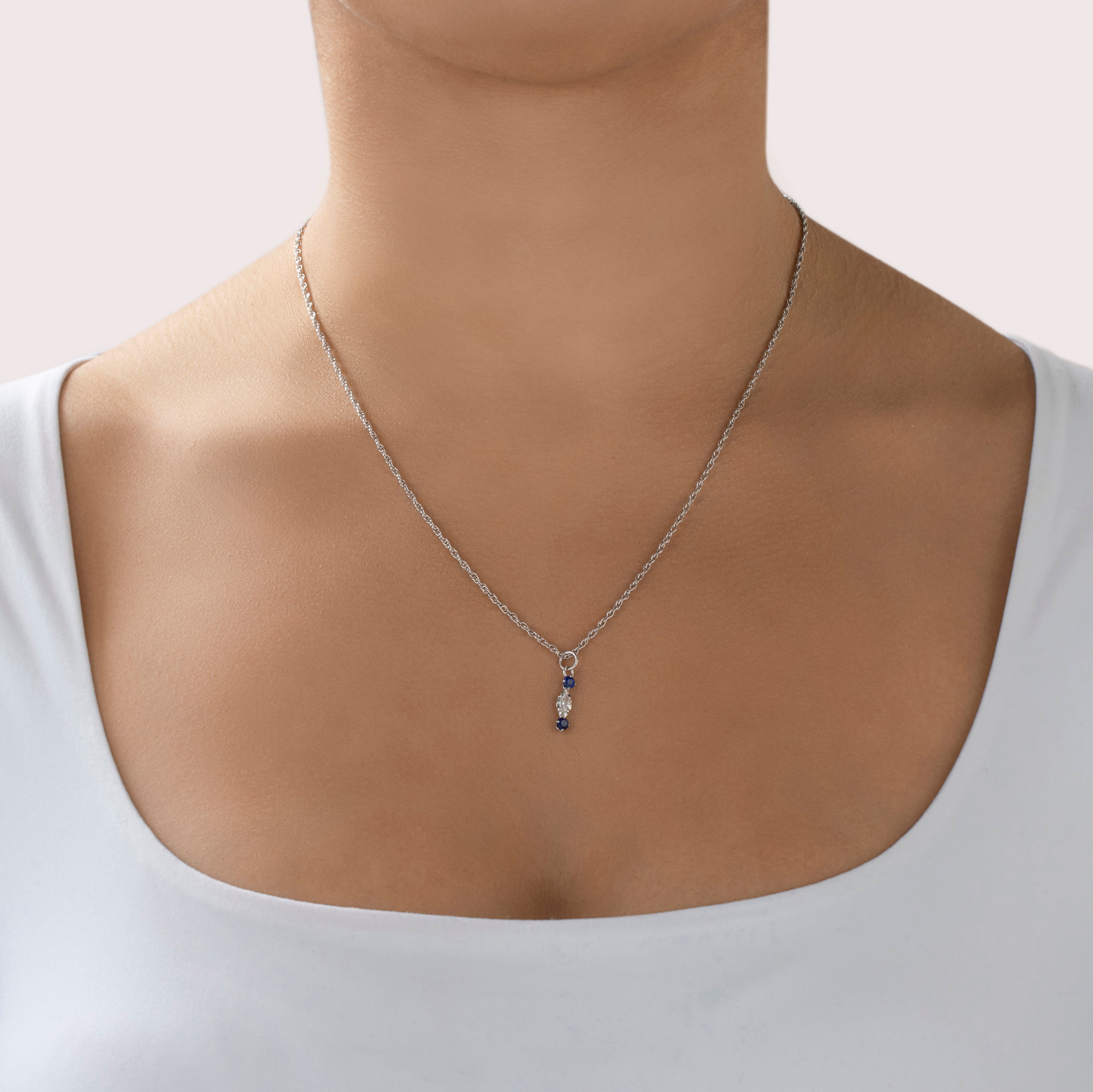 Antique Art Deco 14k White Gold Blue Synthetic Sapphire and Diamond Pendant - On model view