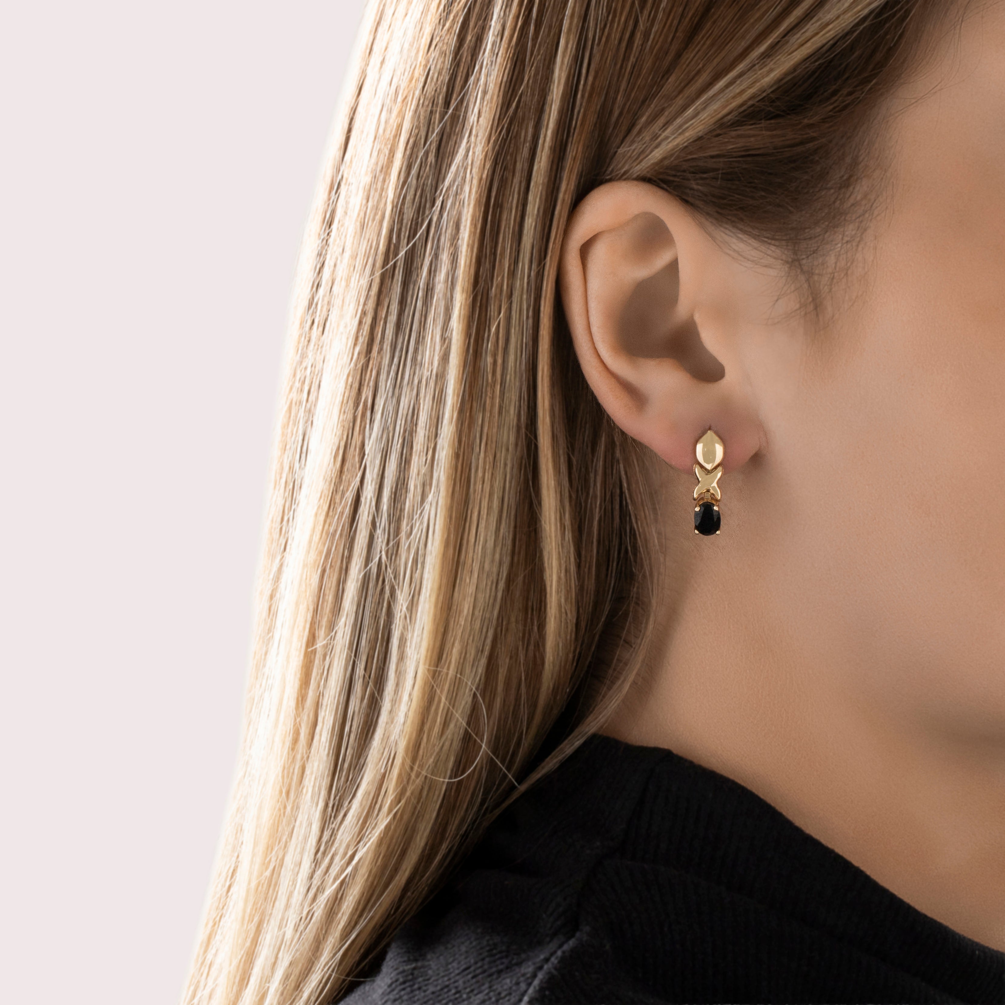 Vintage 14k Yellow Gold Dark Blue Sapphire Knot Drop Earrings - On model view