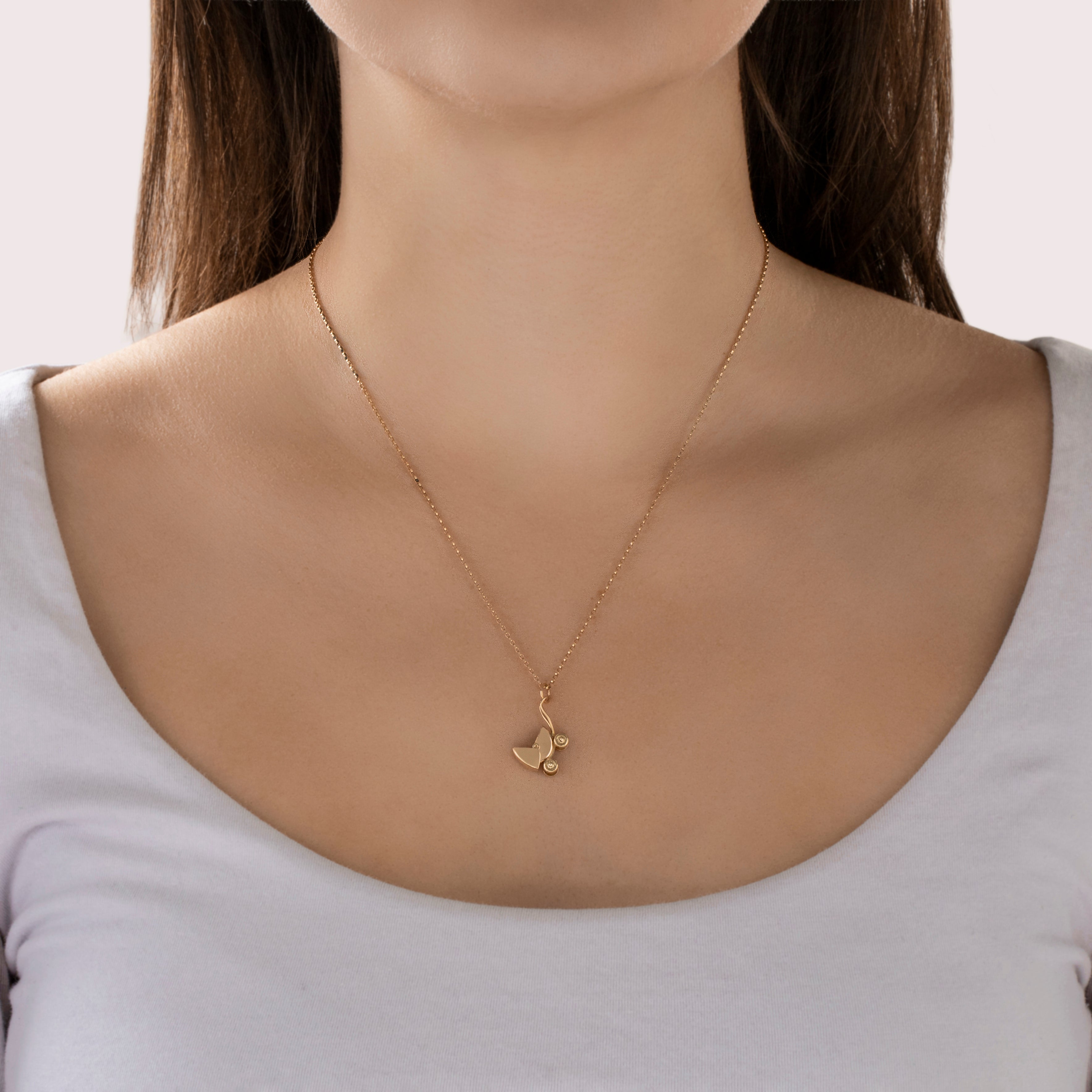 Vintage 14k Yellow Gold Articulating Baby Pram Charm/Pendant - On model view