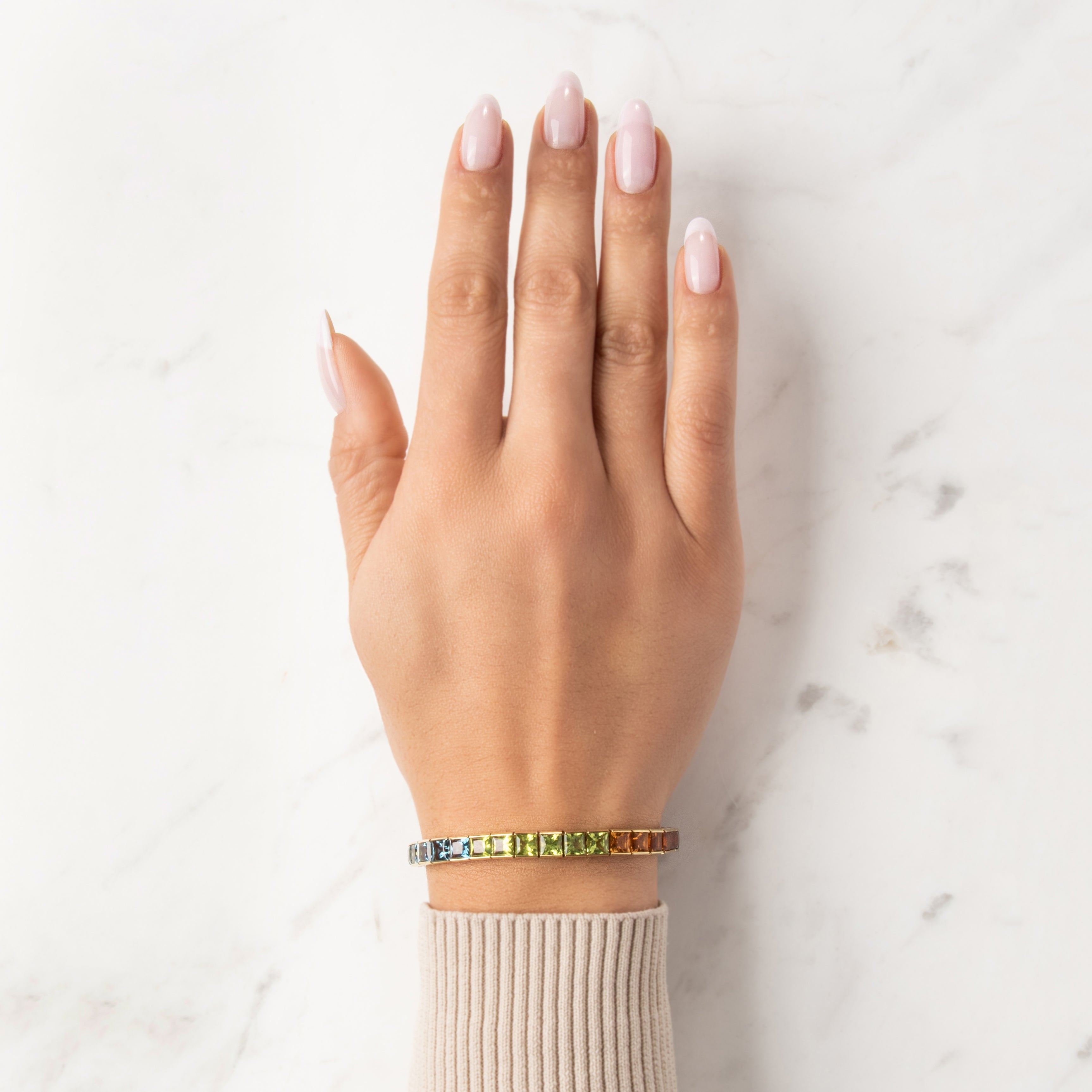 Vintage 18k Yellow Gold 4.71cttw Pink Red Garnet 4.53cttw Blue Topaz 4.17cttw Peridot 3.73cttw Amethyst 3.29cttw Citrine 1.94cttw Iolite Stunning Rainbow Line Bracelet - On model view