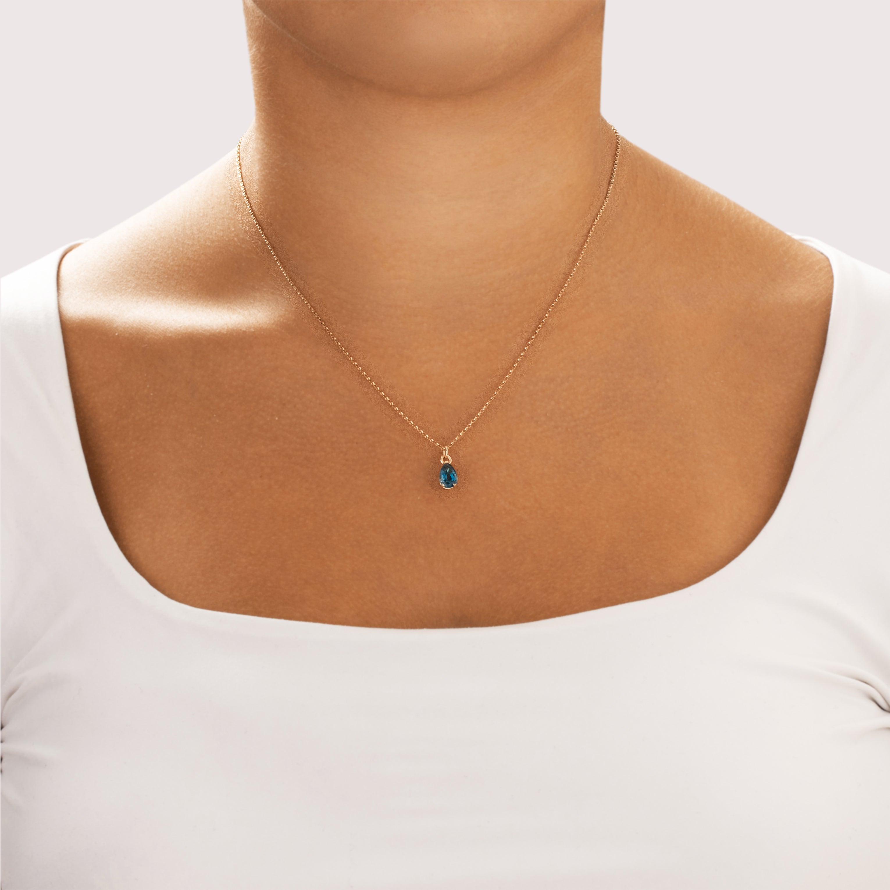 Vintage Small 14k Yellow Gold 1.39ct London Blue Topaz Vibrant Pear Pendant - On model view