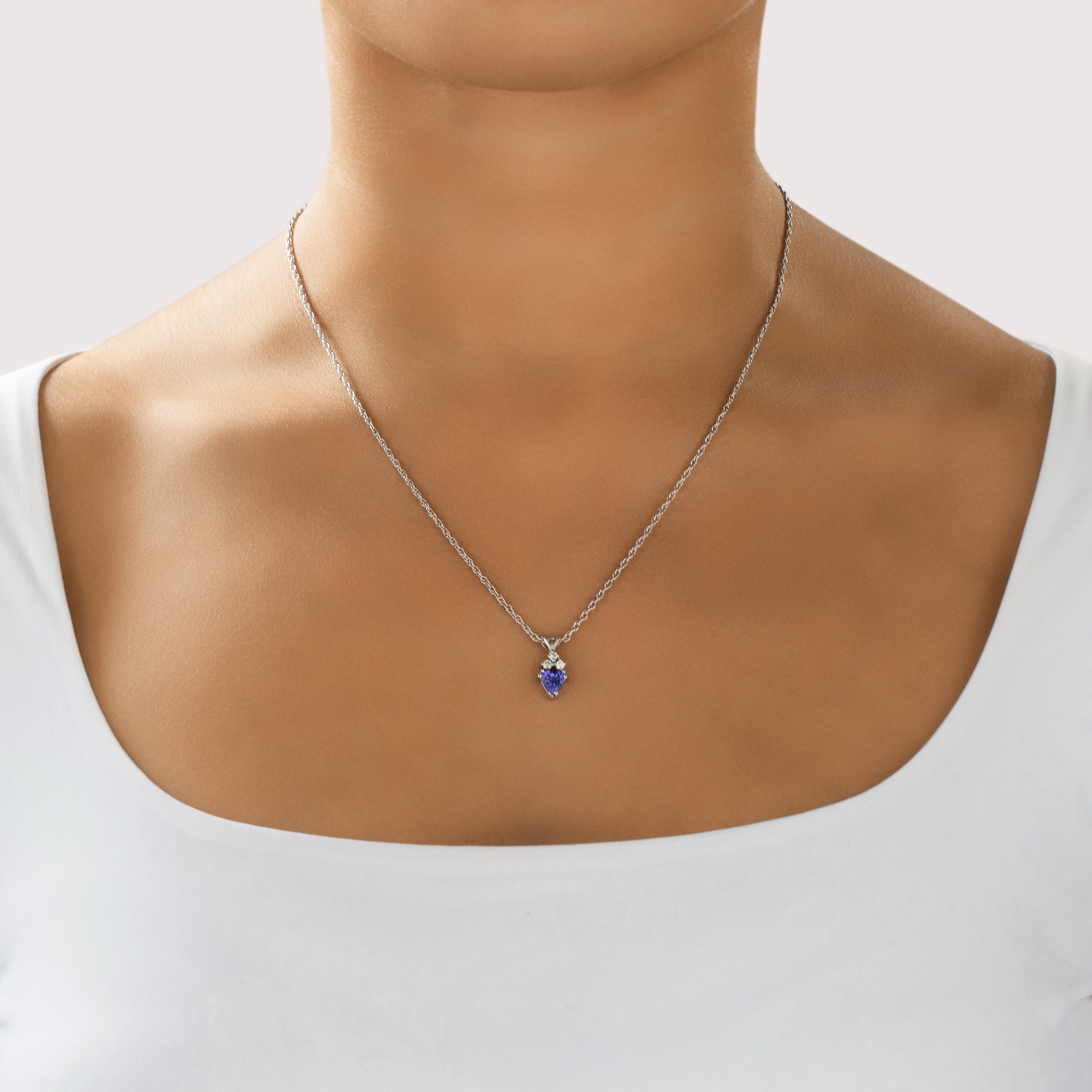 Vintage 14k White Gold .77ct Tanzanite Diamond Trio Accented Trilliant Pendant - On model view