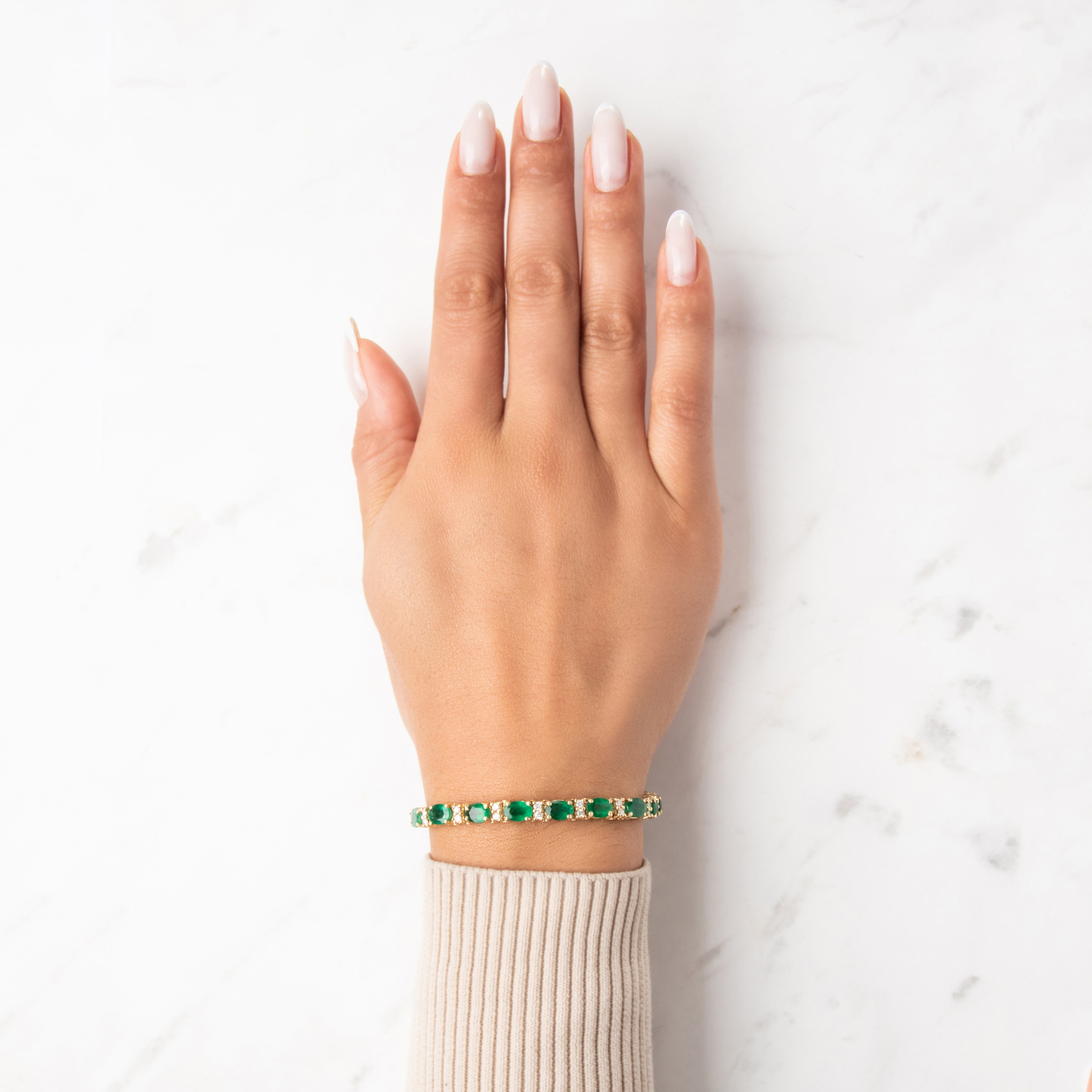 Vintage Substantial 14k Yellow Gold 10.27cttw Emerald .72cttw Diamond Adorned Oval Statement Bracelet - On model view